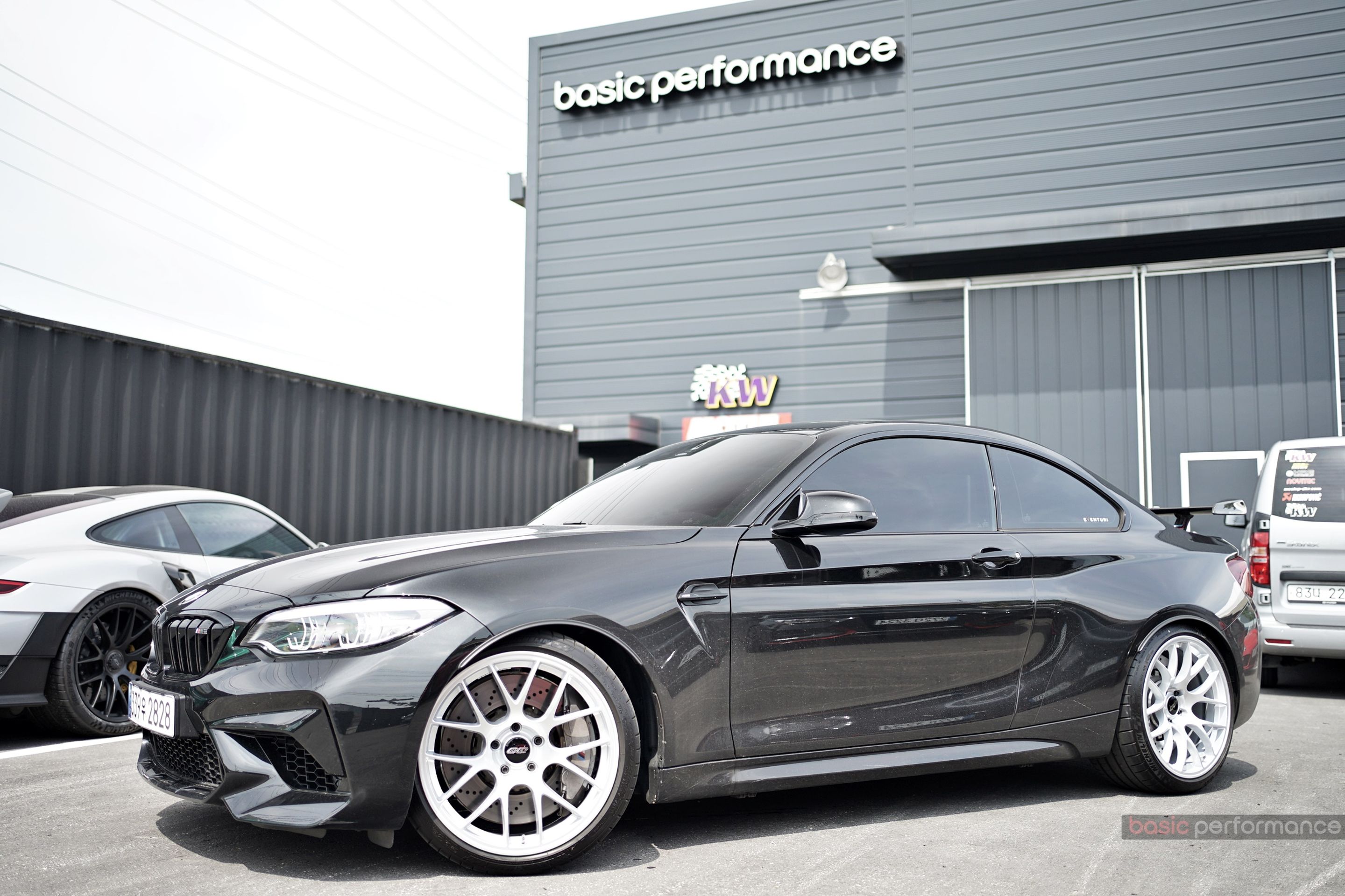 Black BMW F87 M2 with 19" EC-7 Apex wheels in Race Silver