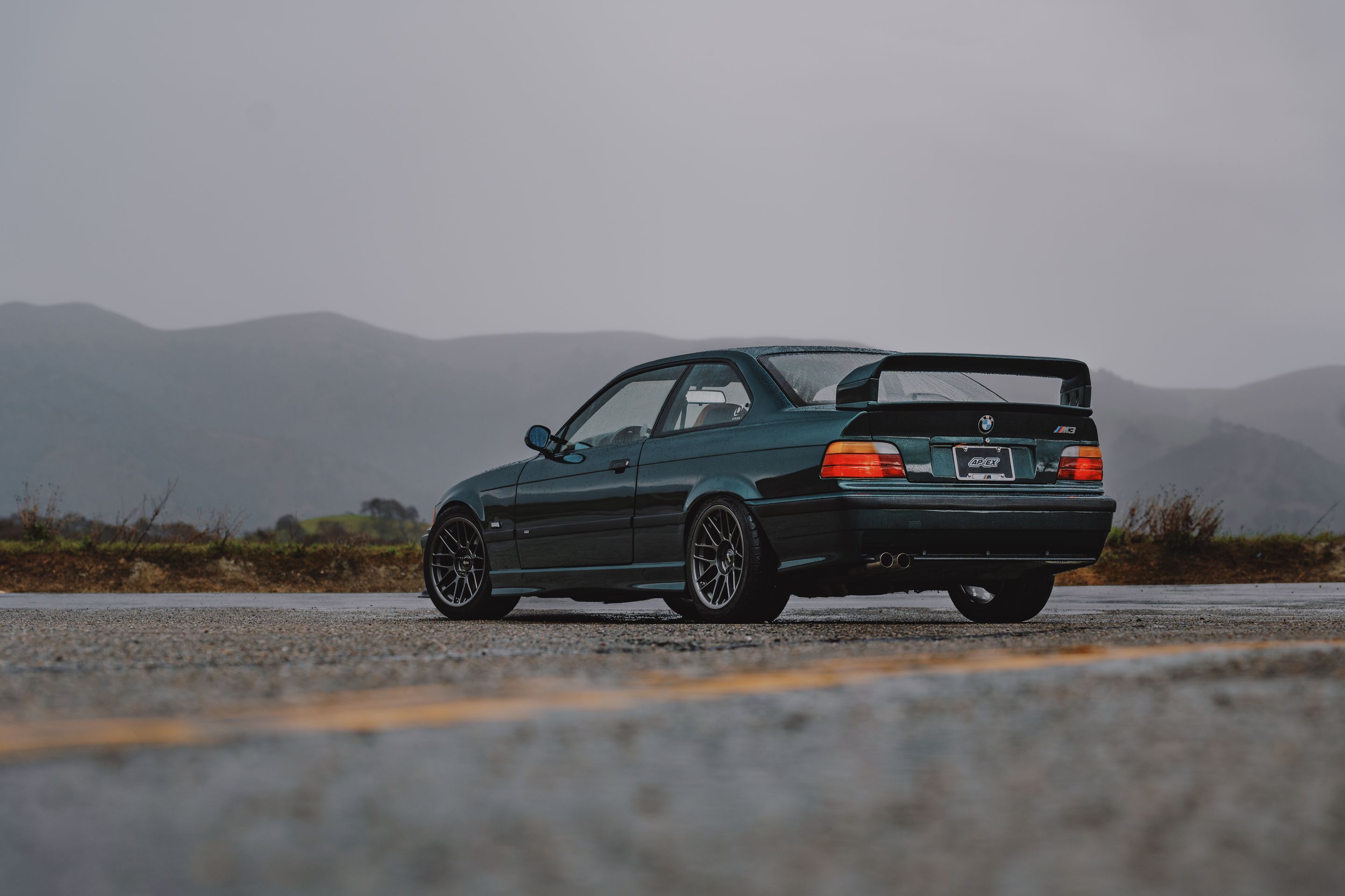 Green BMW E36 M3 with 17" ARC-8RT Apex wheels in Anthracite
