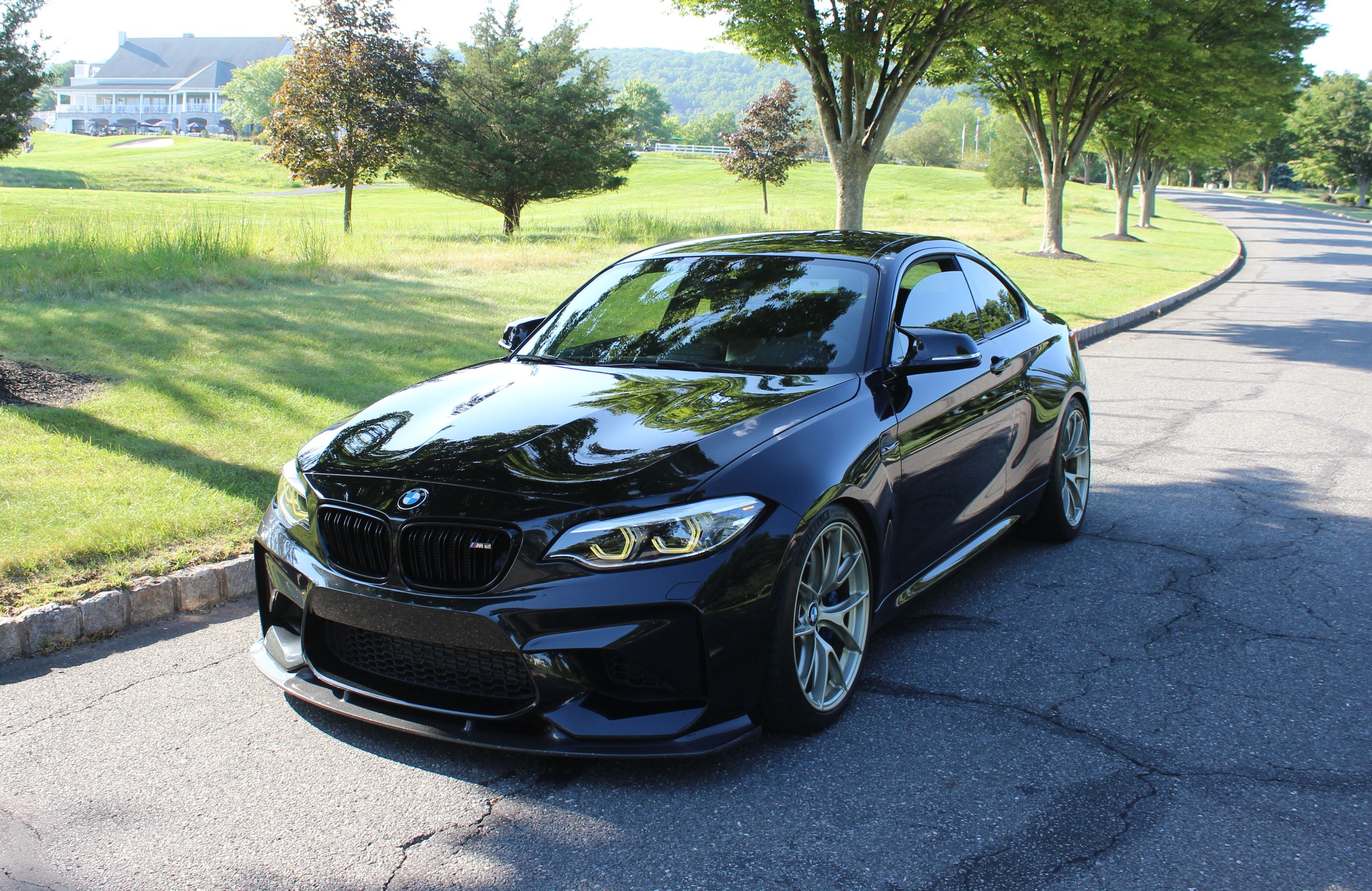 Black BMW F87 M2 with 19" VS-5RS Apex wheels in Motorsport Gold