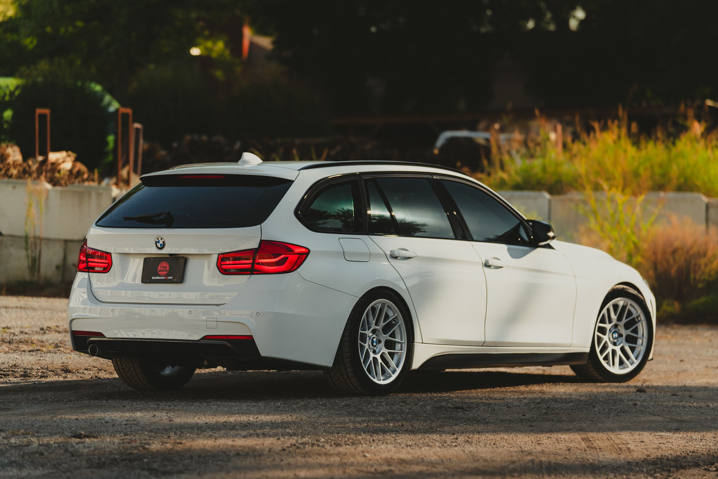 White BMW F31 Wagon 3 Series with 18" ARC-8 Apex wheels in Race Silver