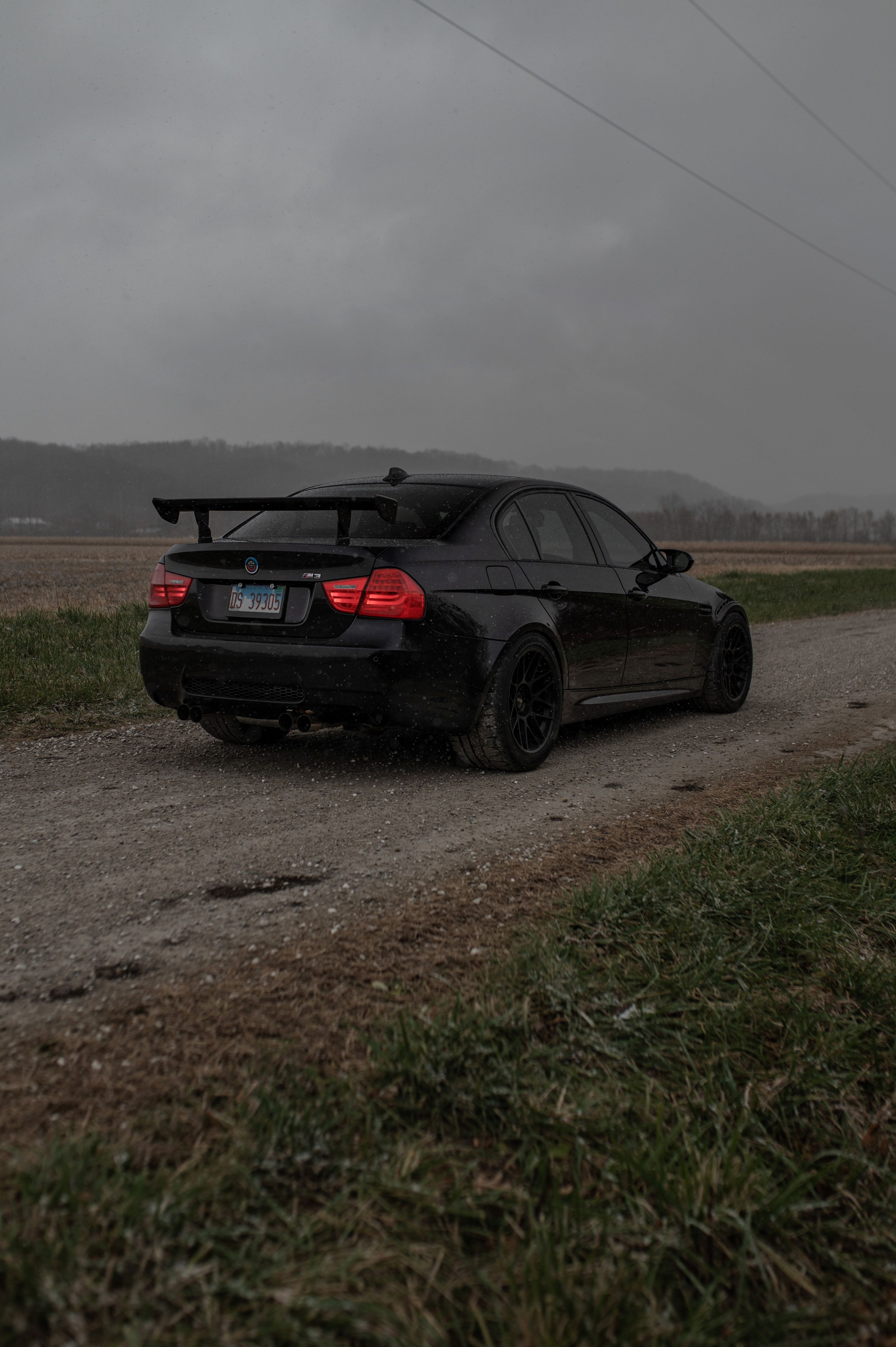 Black BMW E90 Sedan M3 with 18" ARC-8 Apex wheels in Satin Black