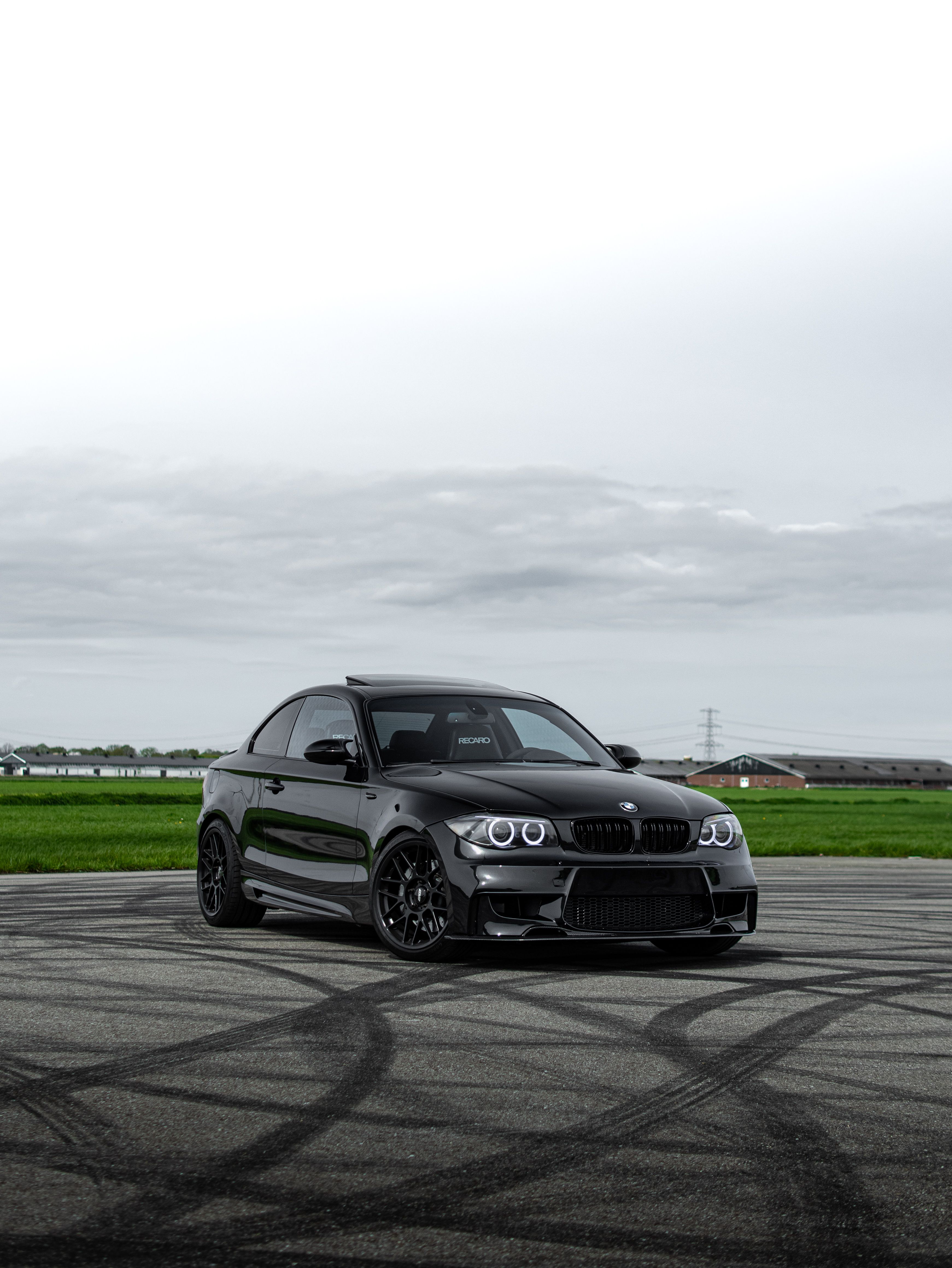 Black BMW E82 Coupe 1 Series with 18" ARC-8 Apex wheels in Satin Black