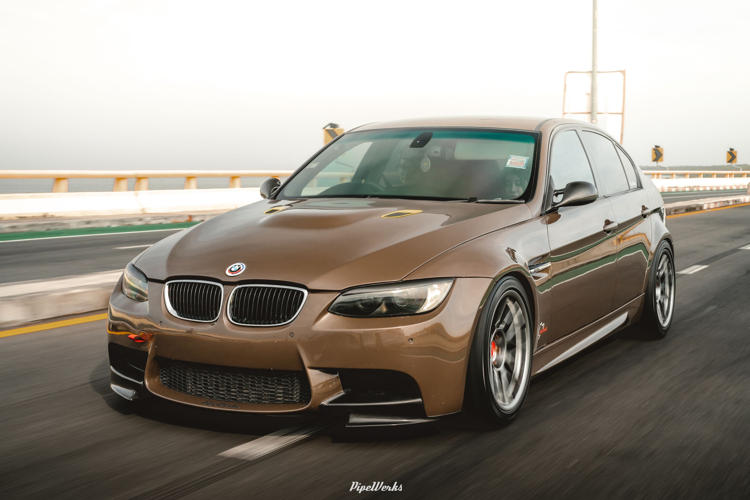 Brown BMW E90 Sedan 3 Series with 18" ARC-8 Apex wheels in Hyper Black