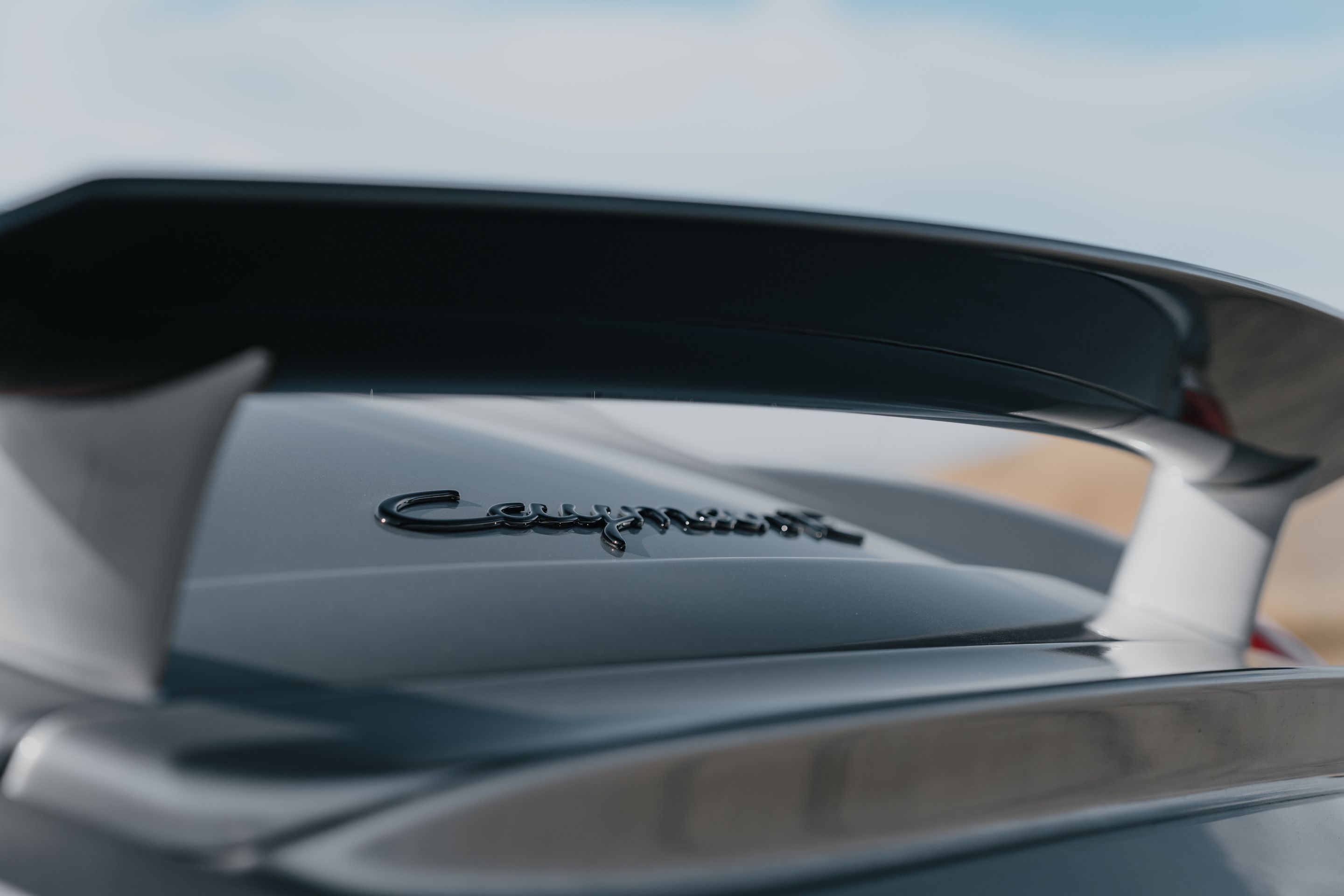 Silver Porsche 987 Cayman R with 18" SM-10RS Apex wheels in Satin Black