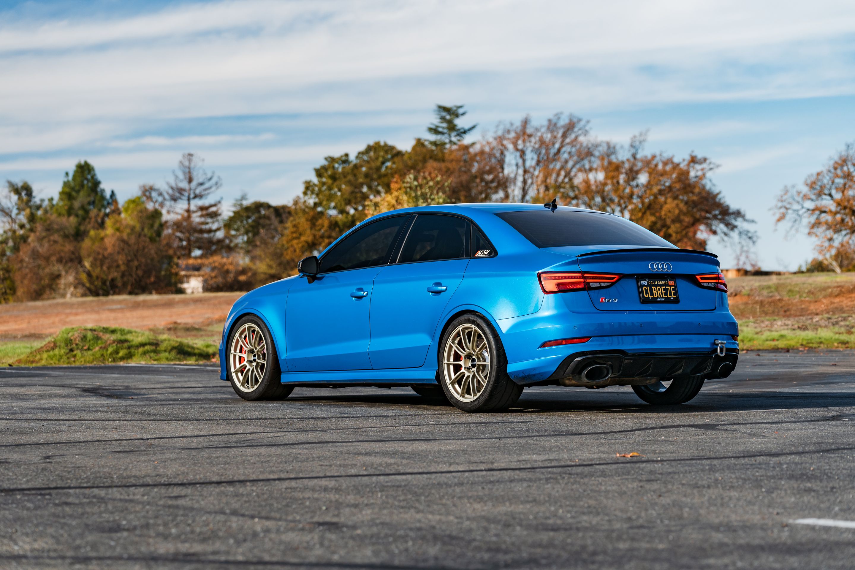 Blue Audi 8V RS 3 with 18" SM-10RS Apex wheels in Motorsport Gold