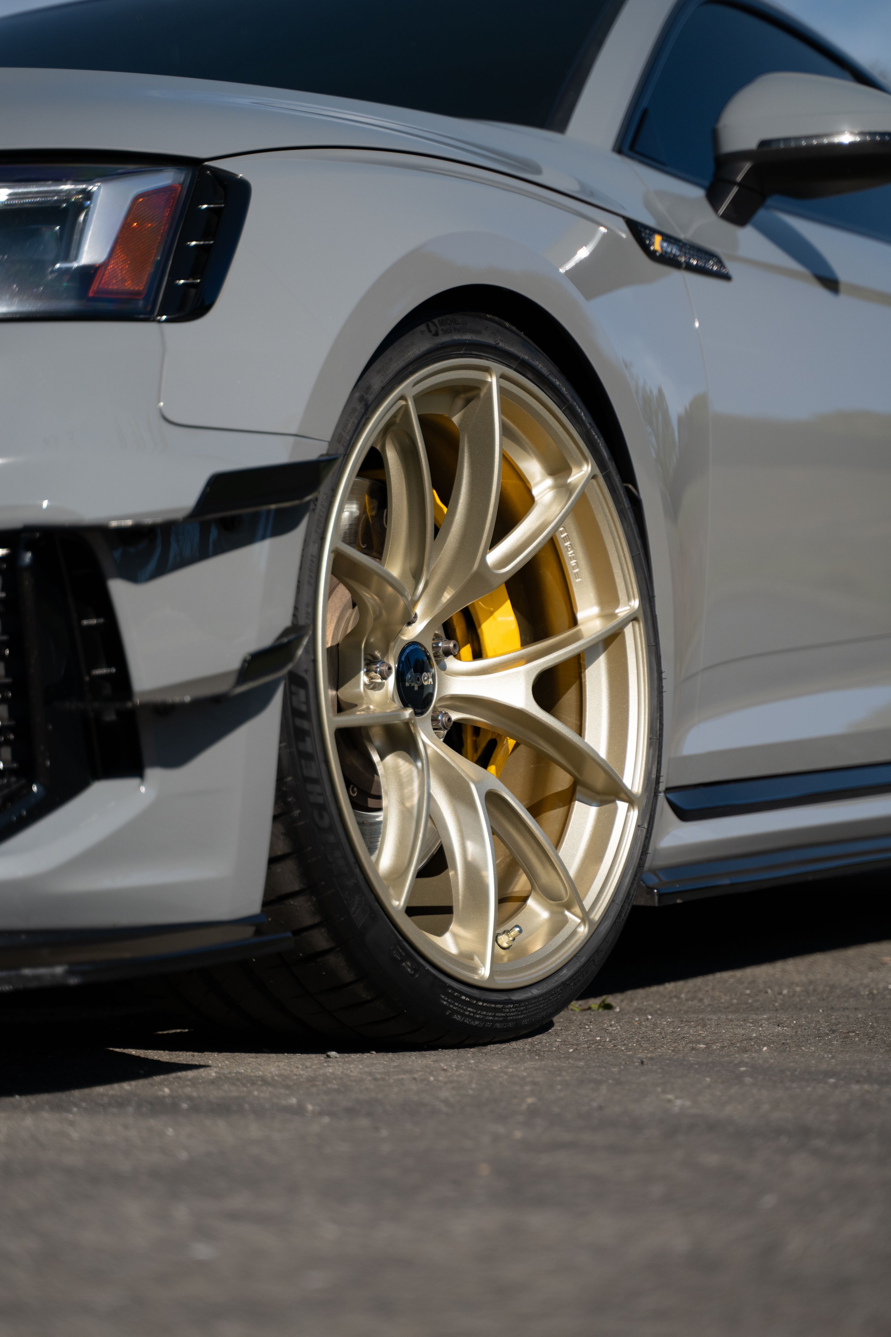 Grey Audi B9 RS 5 Coupe with 20" VS-5RS Apex wheels in Motorsport Gold
