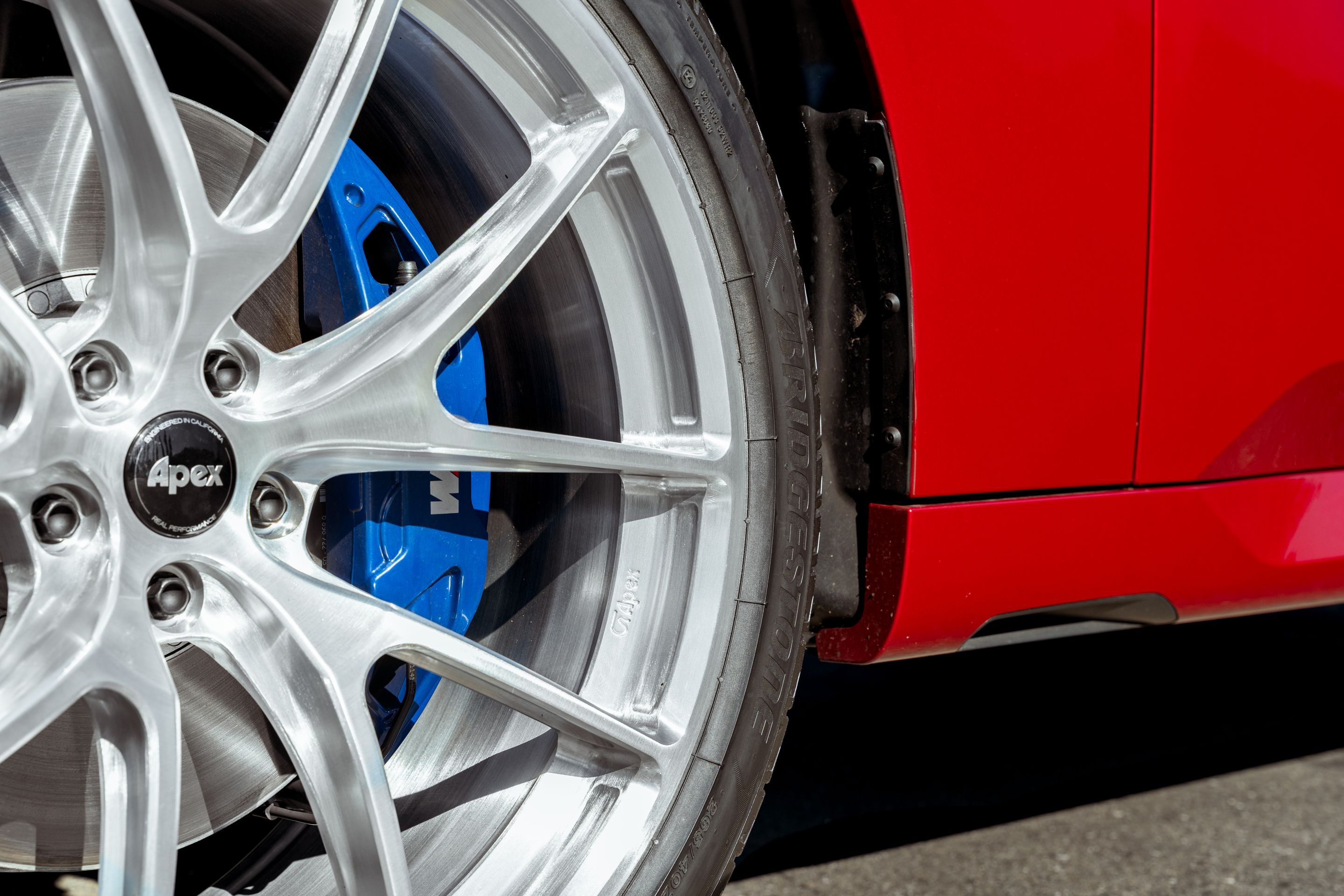 Red BMW G45 X3 with 21" VS-5RX Apex wheels in Brushed Clear