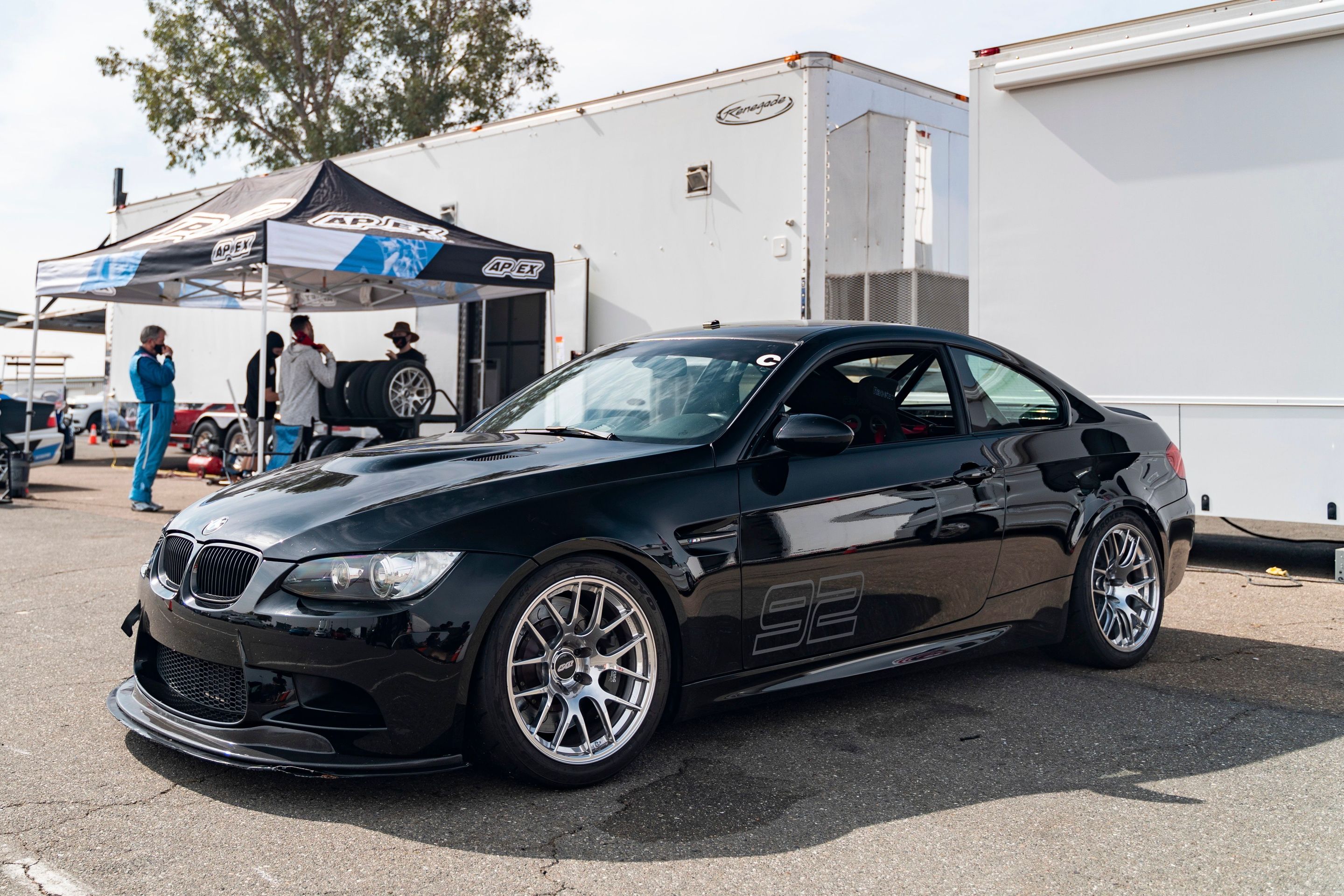Black BMW E92 Coupe M3 with 18" EC-7R Apex wheels in Brushed Clear
