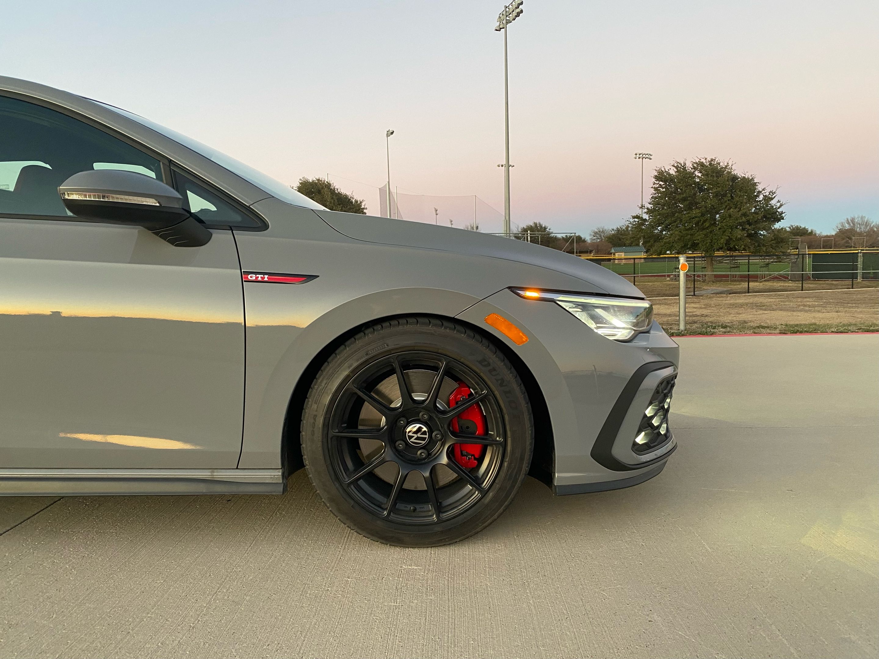 Grey VW MK8 Golf with 17" SM-10 Apex wheels in Satin Black