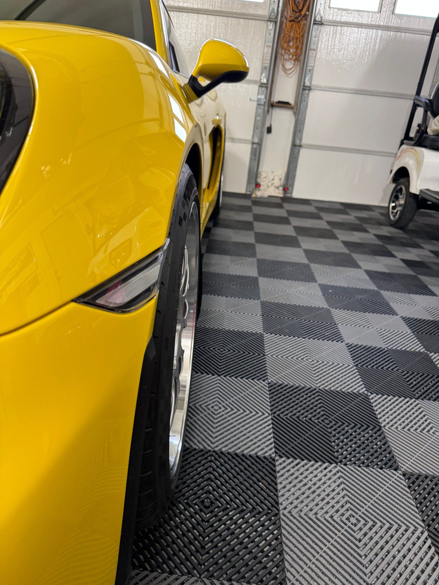 Yellow Porsche 981 Cayman GT4 with 19" ML-10RT Apex wheels in Machined Lip Race Silver