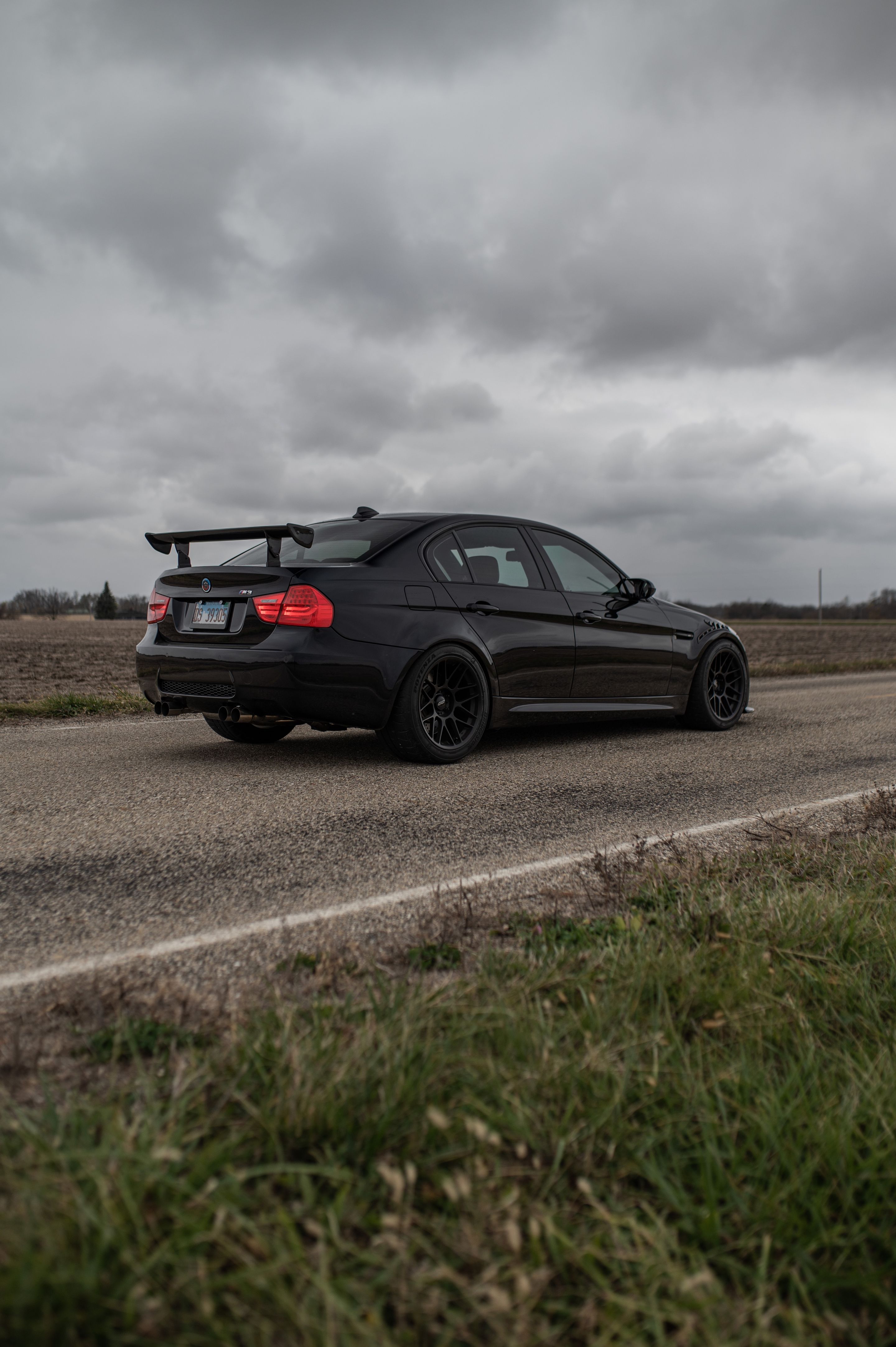 Black BMW E90 Sedan M3 with 18" ARC-8 Apex wheels in Satin Black
