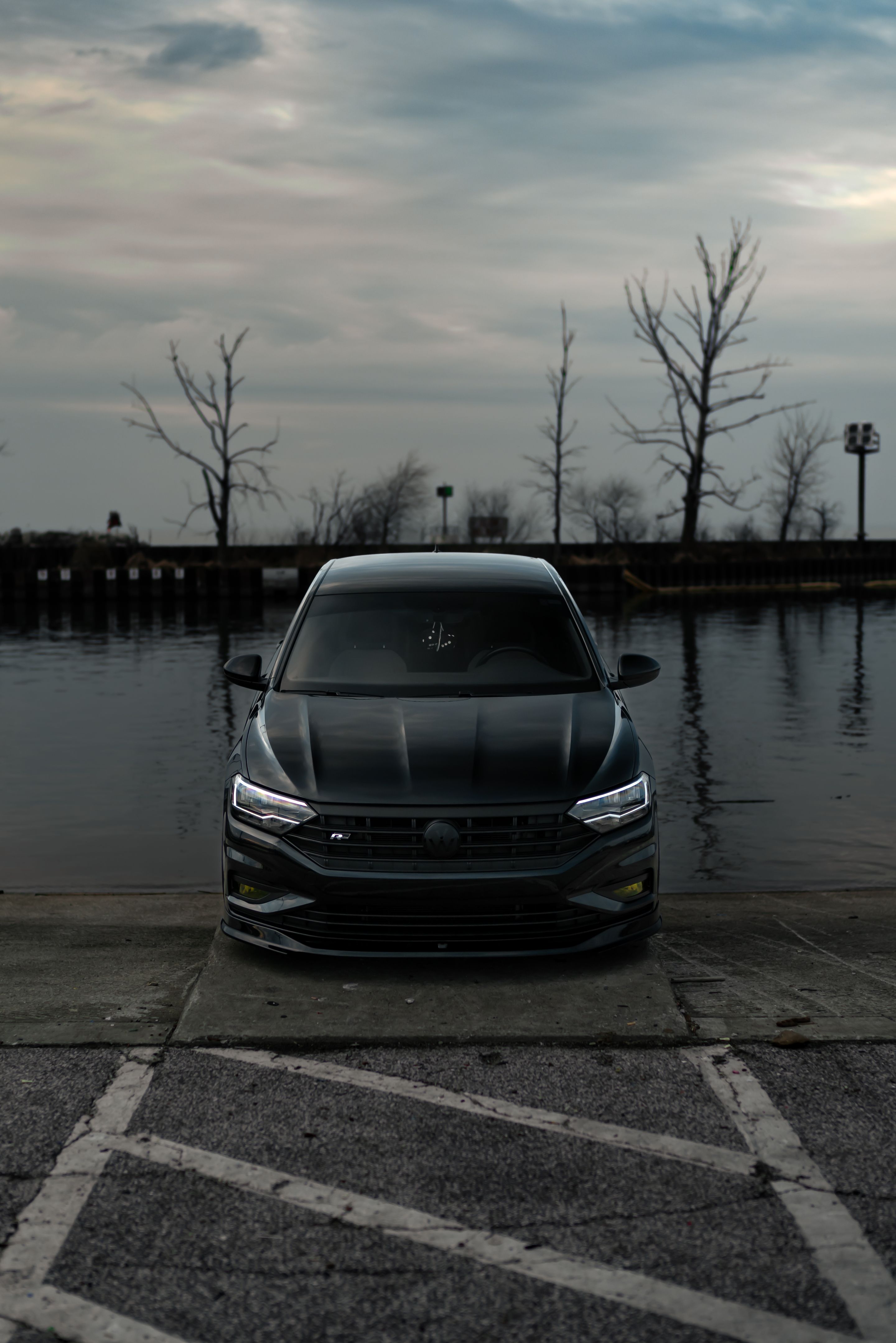 Black VW MK7 Jetta with 19" ML-10RT Apex wheels in Machined Lip Race Silver