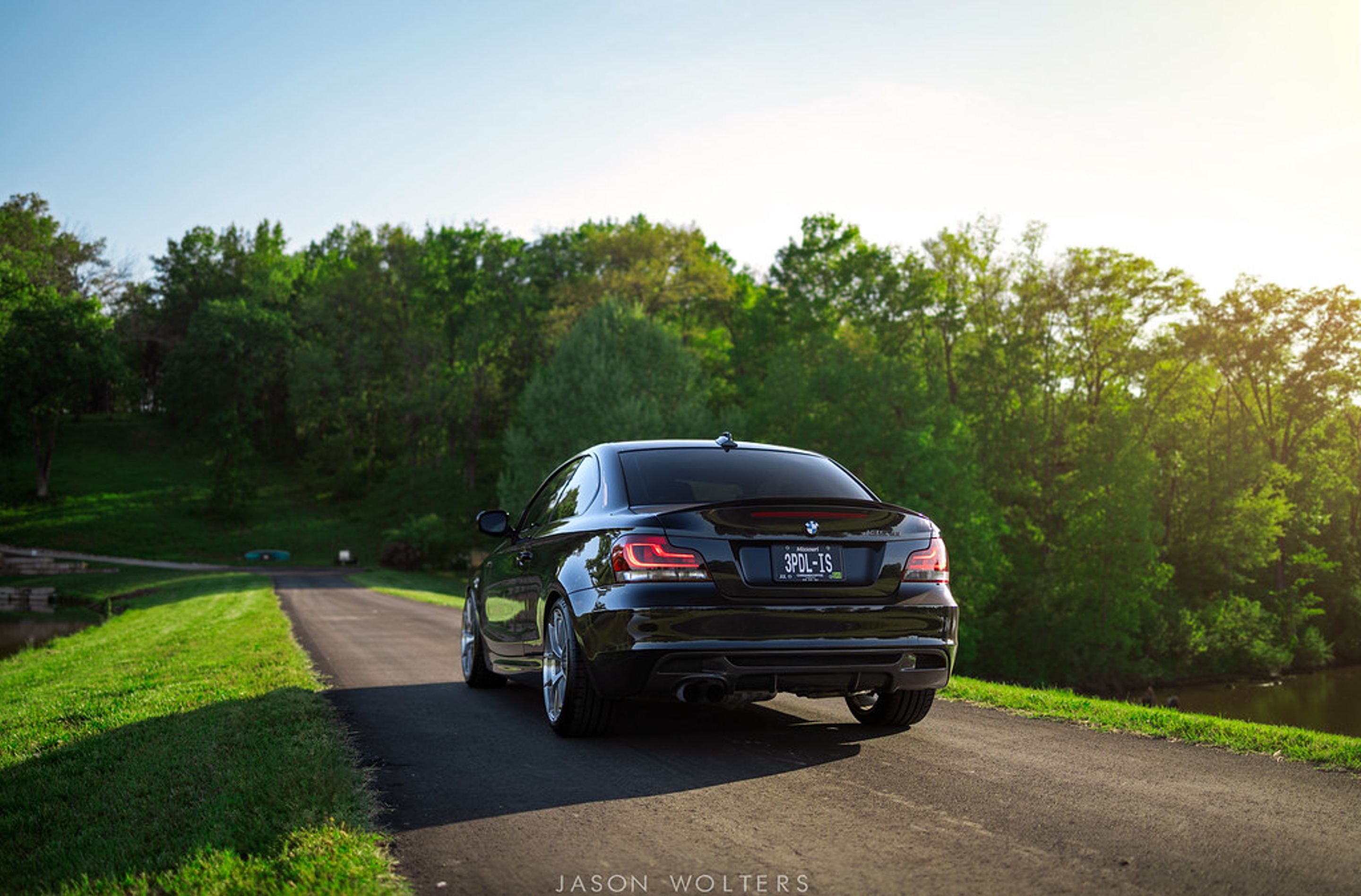 Black BMW E82 Coupe 1 Series with 18" VS-5RS Apex wheels in Brushed Clear