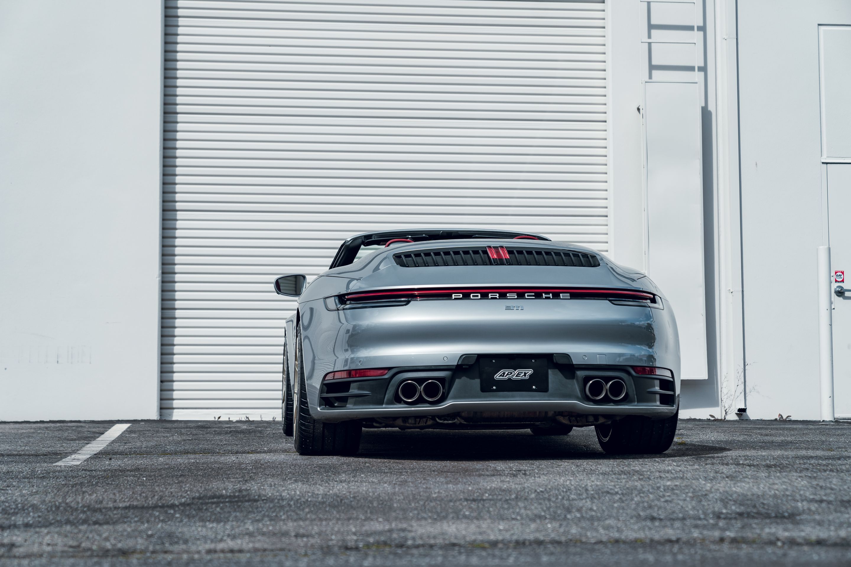 Silver Porsche 911 992.1 Carrera S with 19"/20" VS-5RS Apex wheels in Motorsport Gold