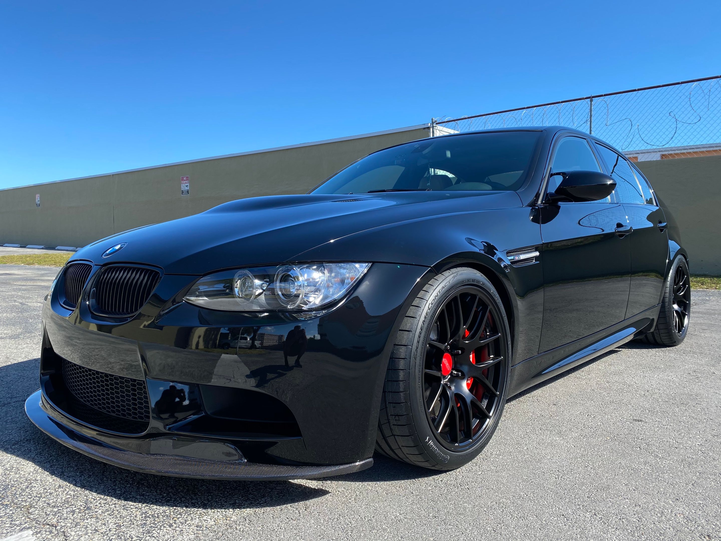 Black BMW E90 Sedan M3 with 18" EC-7R Apex wheels in Satin Black