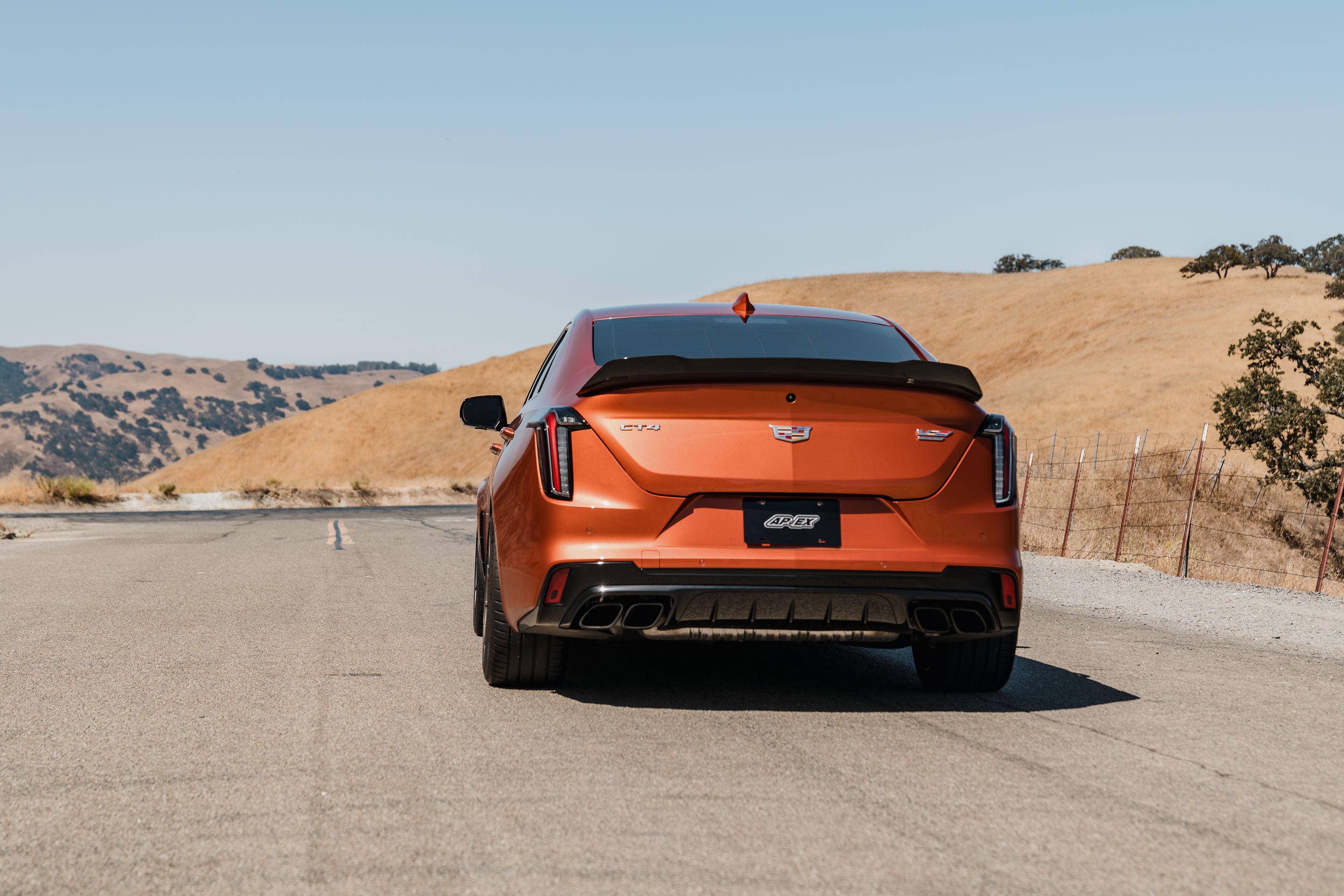 Orange Cadillac CT4-V Blackwing with 18" VS-5RS Apex wheels in Anthracite