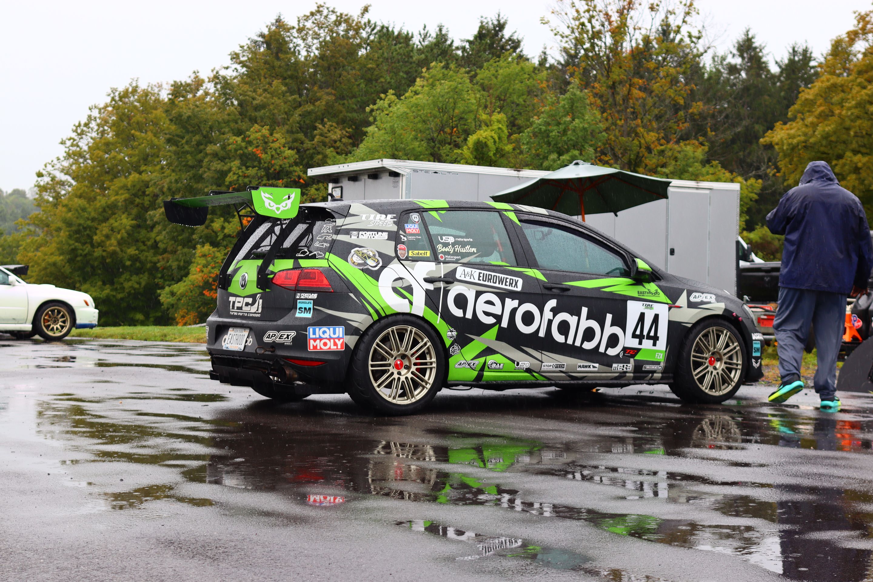 Race Livery VW MK7 GTI with 18" TC-10RT Apex wheels in Motorsport Gold