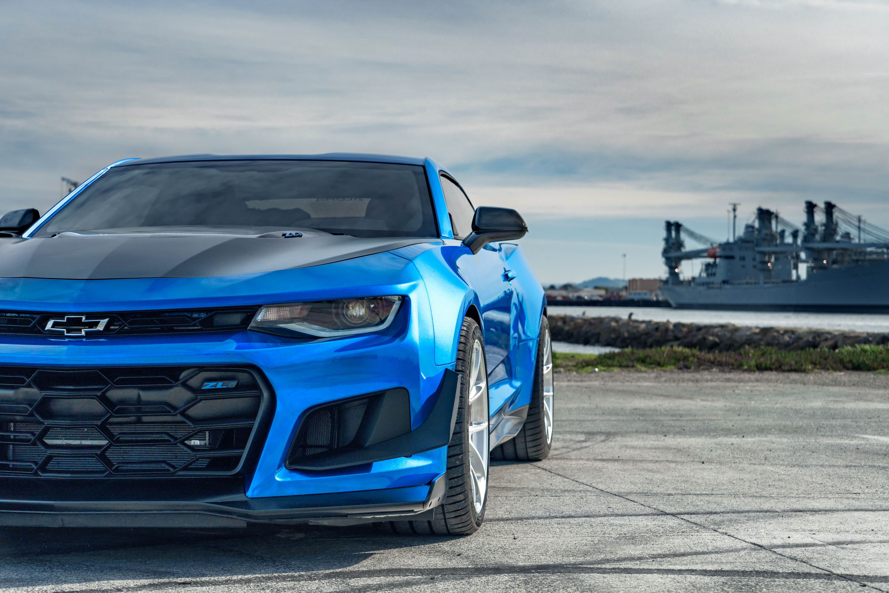 Blue Chevrolet 6th Gen Camaro ZL1 1LE with 19" VS-5RS Apex wheels in Brushed Clear