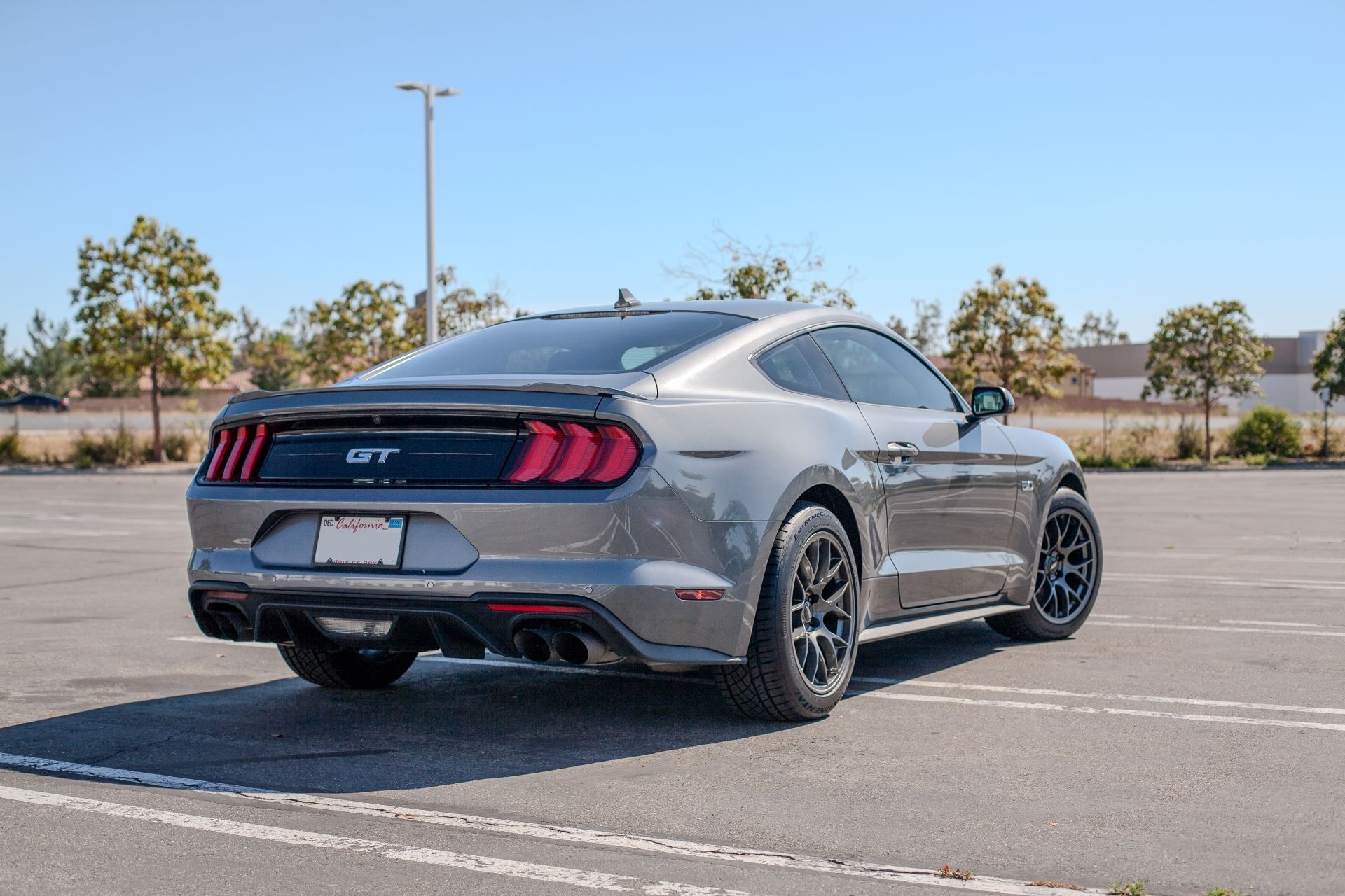 Grey Ford S550 Mustang GT with 18" EC-7 Apex wheels in Anthracite