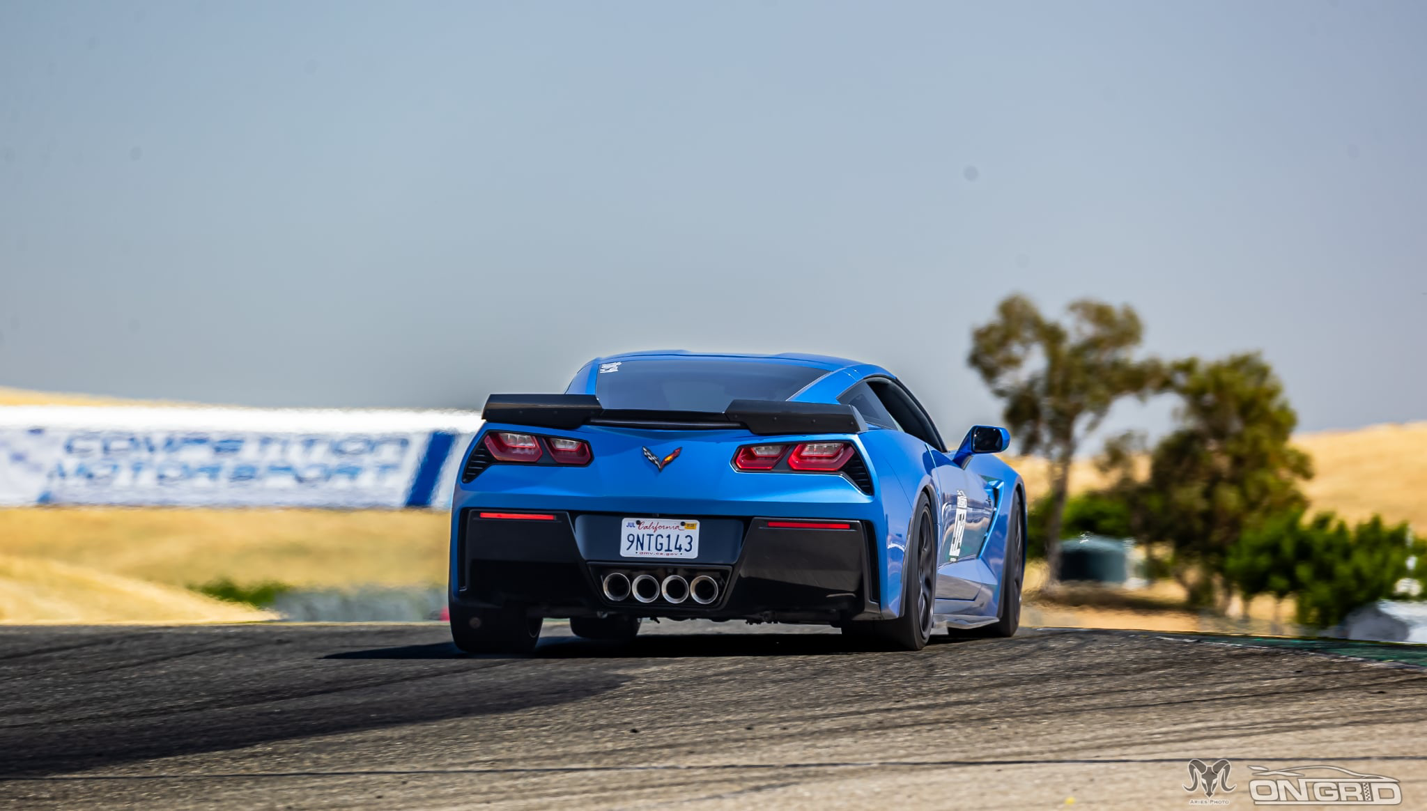 Blue Chevrolet C7 Corvette Stingray/Z51 with 18"/19" EC-7 Apex wheels in Satin Black