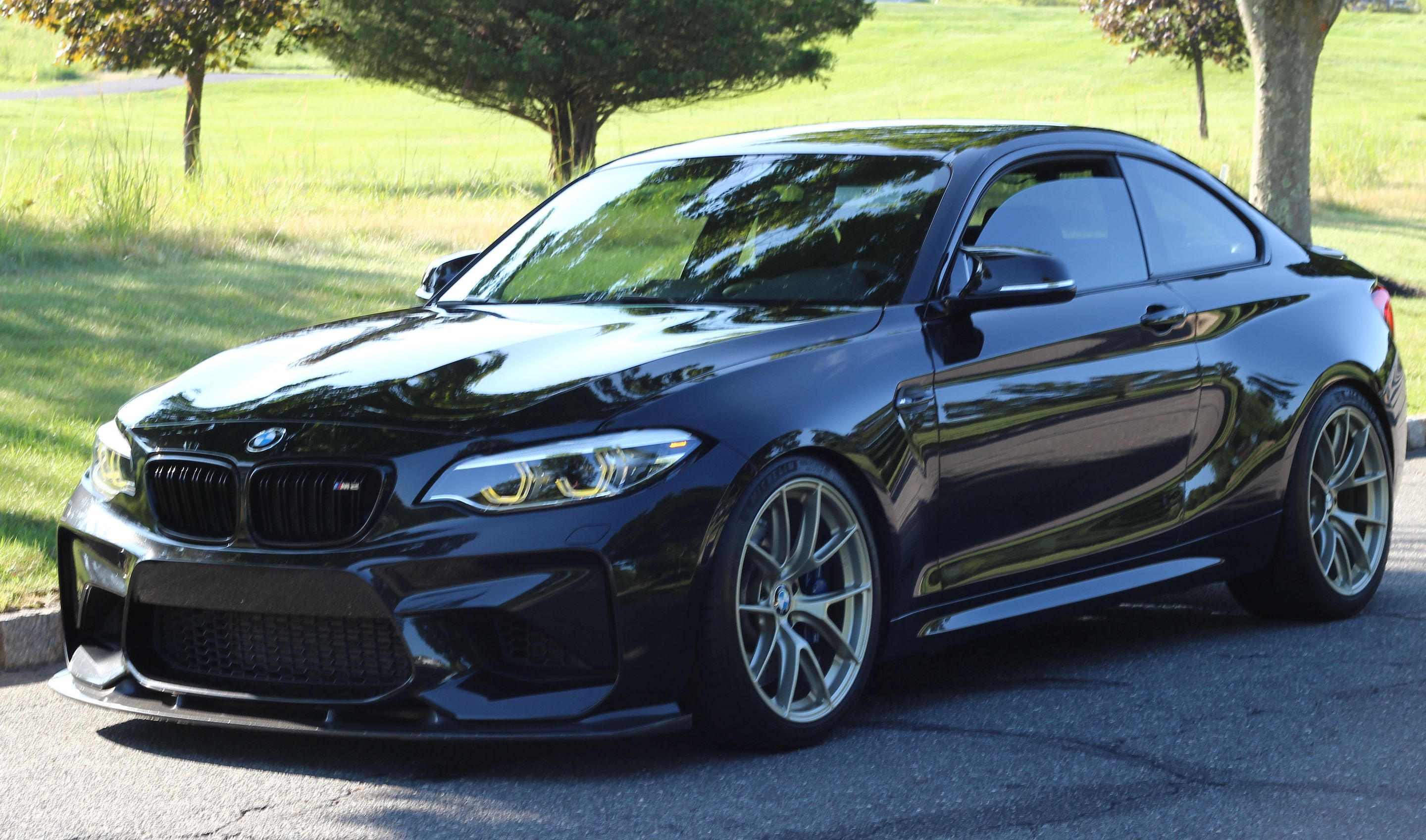 Black BMW F87 M2 with 19" VS-5RS Apex wheels in Motorsport Gold