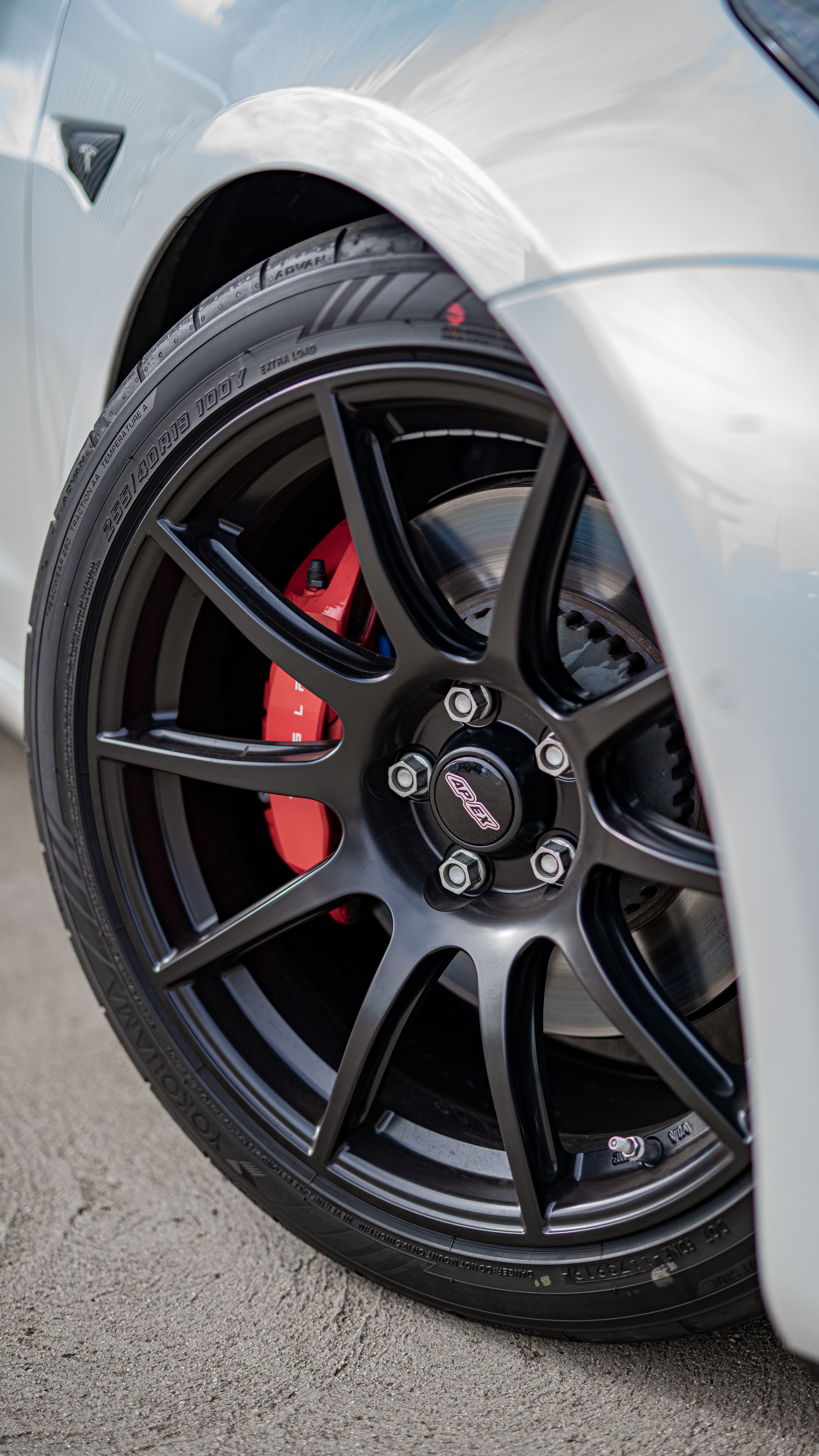 White Tesla Model 3 with 19" SM-10 Apex wheels in Satin Black