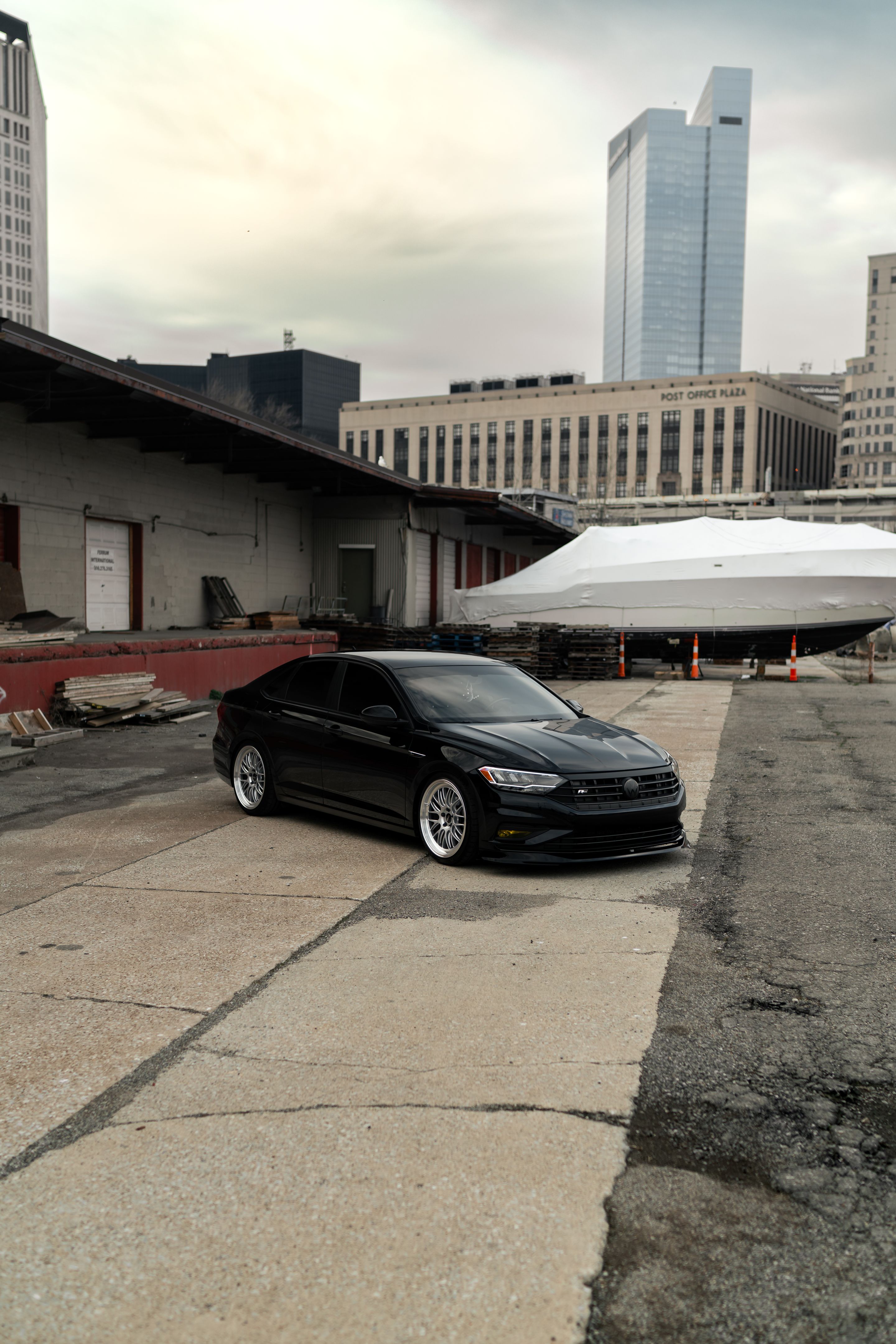 Black VW MK7 Jetta with 19" ML-10RT Apex wheels in Machined Lip Race Silver