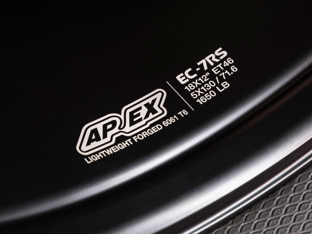 Macro shot of laser-etched APEX Wheels logo on inner barrel of EC-7RS wheel