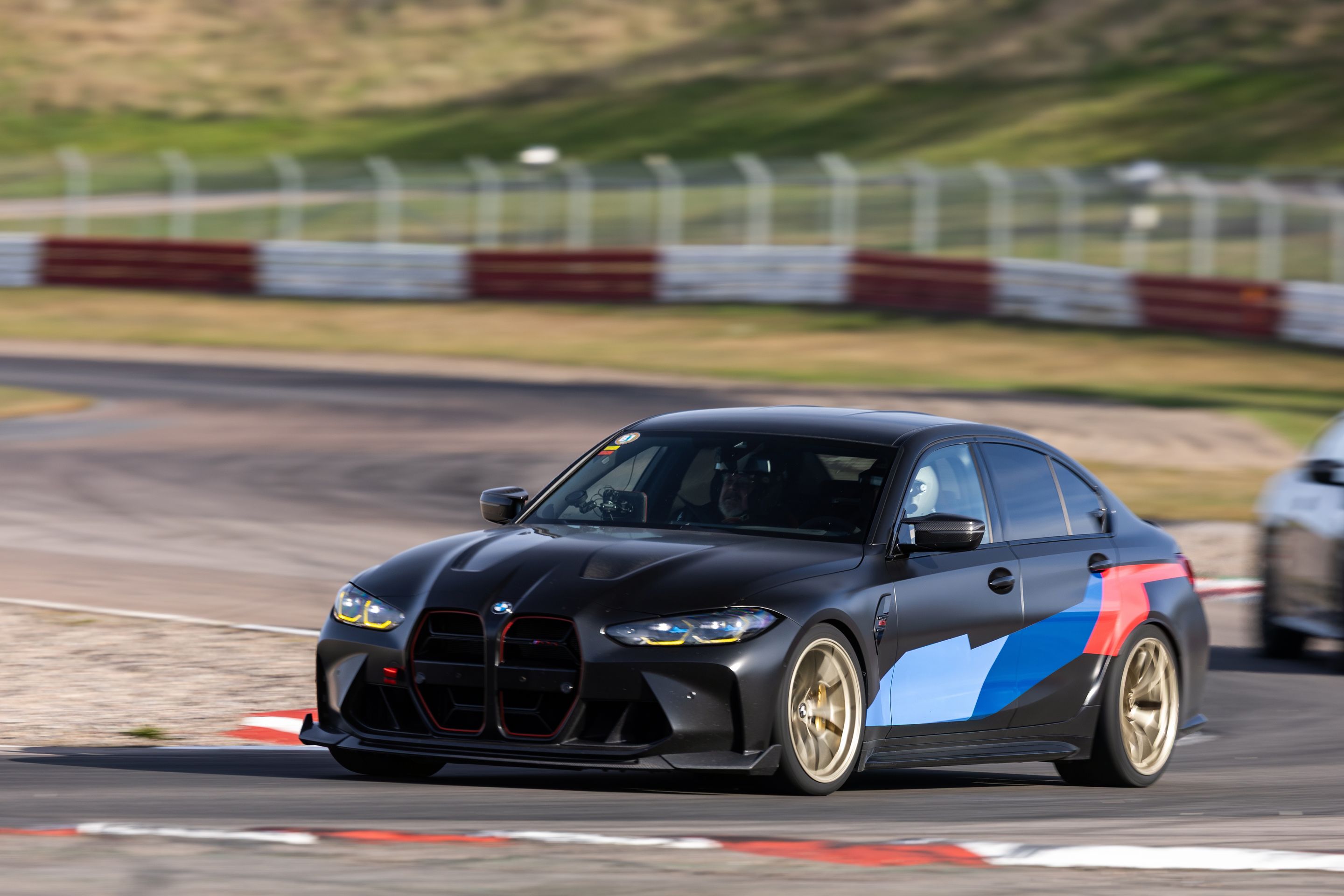 Black BMW G80 M3 with 19" VS-5RS Apex wheels in Motorsport Gold