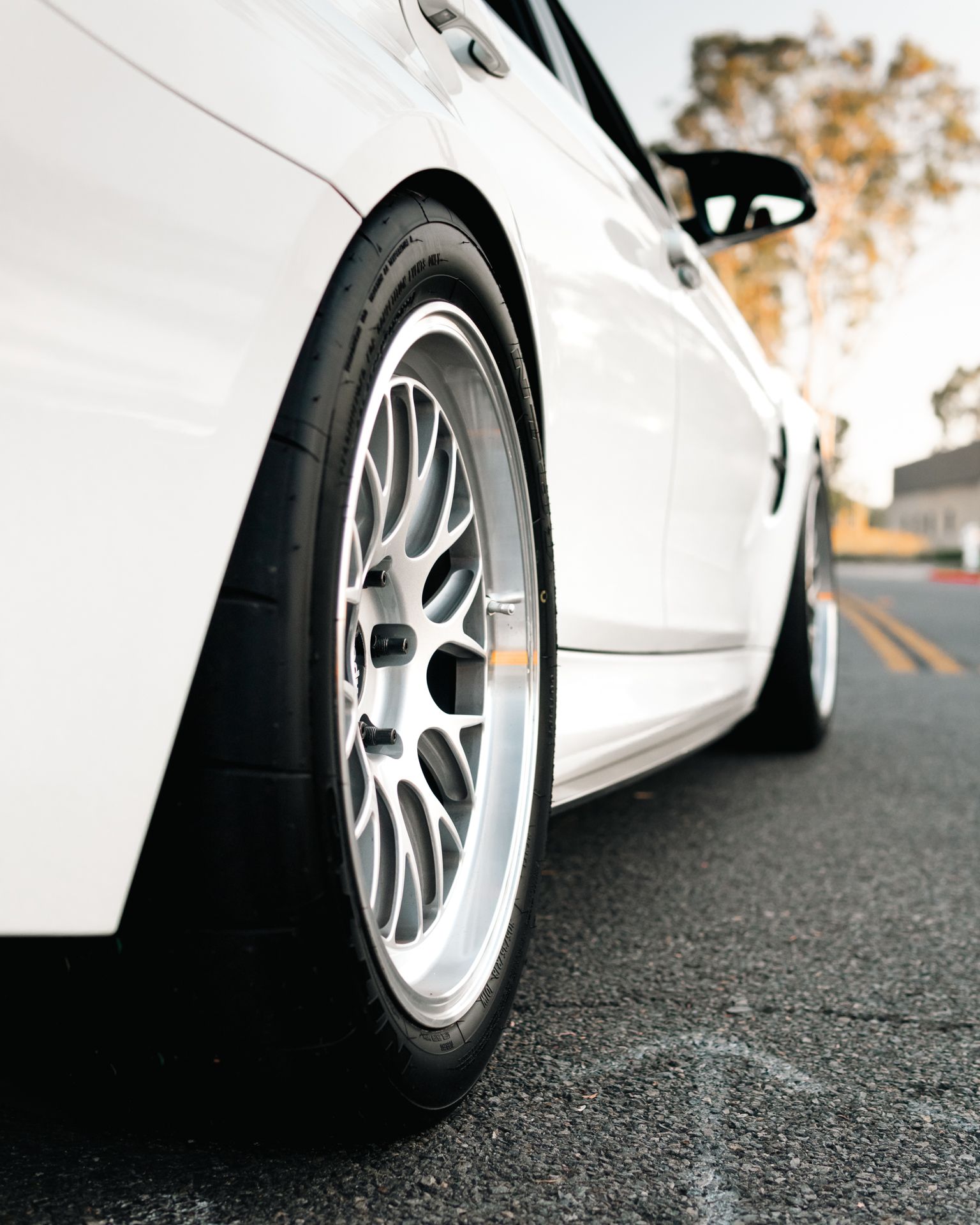 White BMW F80 M3 with 18" ML-10RT Apex wheels in Machined Lip Race Silver