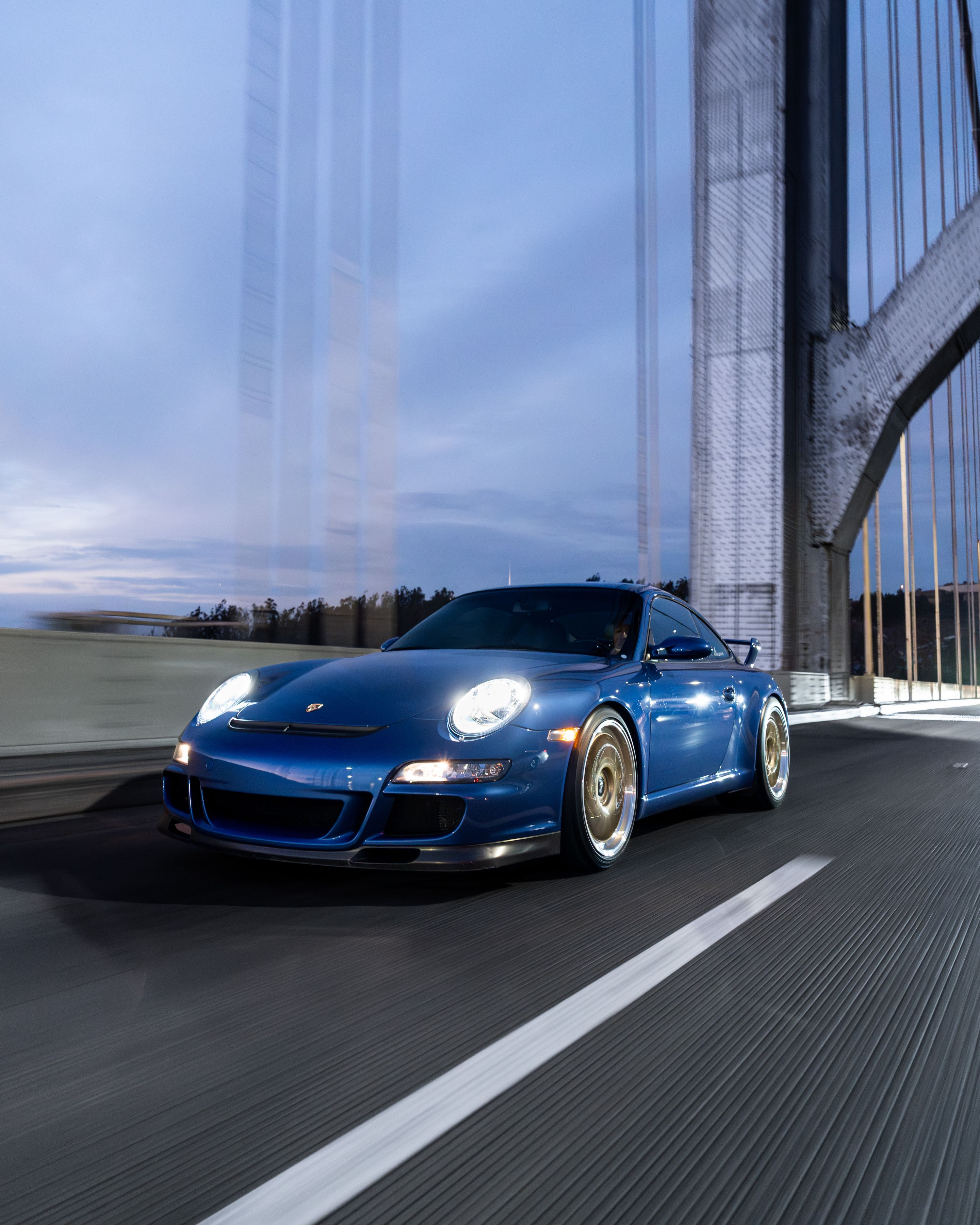 Blue Porsche 911 997 GT3 with 19" TEST-M Apex wheels in Machined Lip Gloss Motorsport Gold