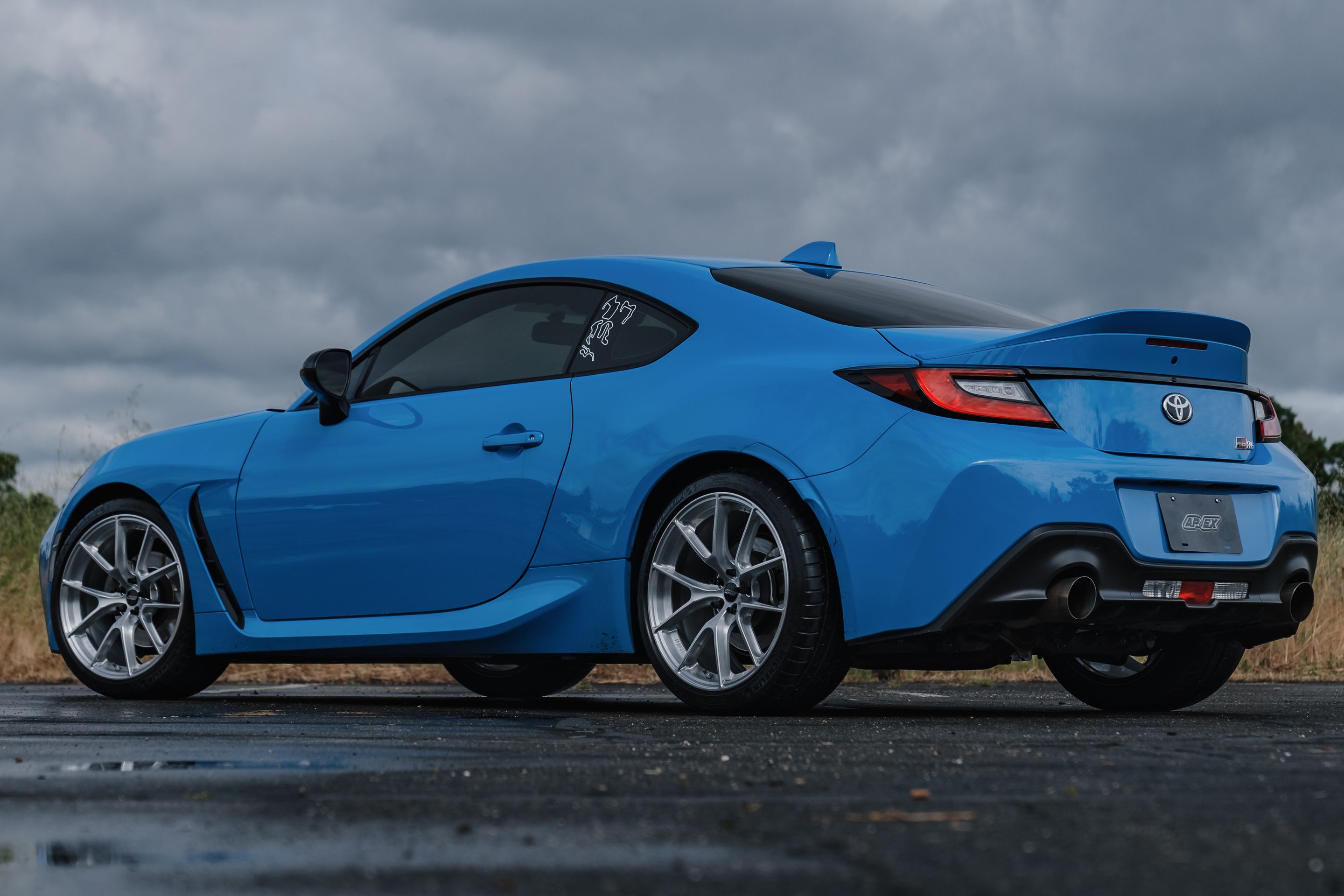 Blue Toyota GR86 with 18" VS-5RS Apex wheels in Brushed Clear