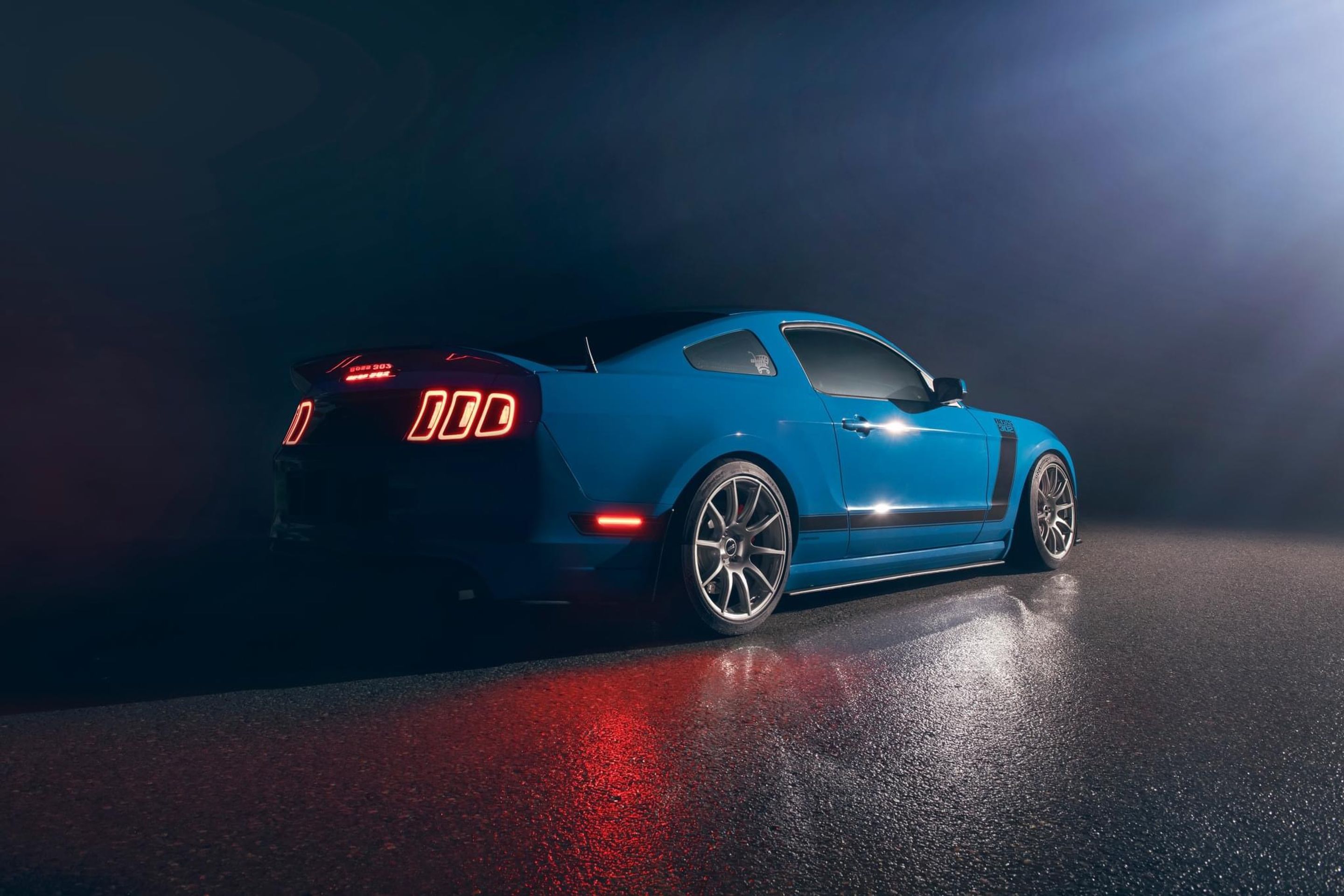 Blue Ford S197 Mustang Boss 302 with 19" SM-10 Apex wheels in Race Silver