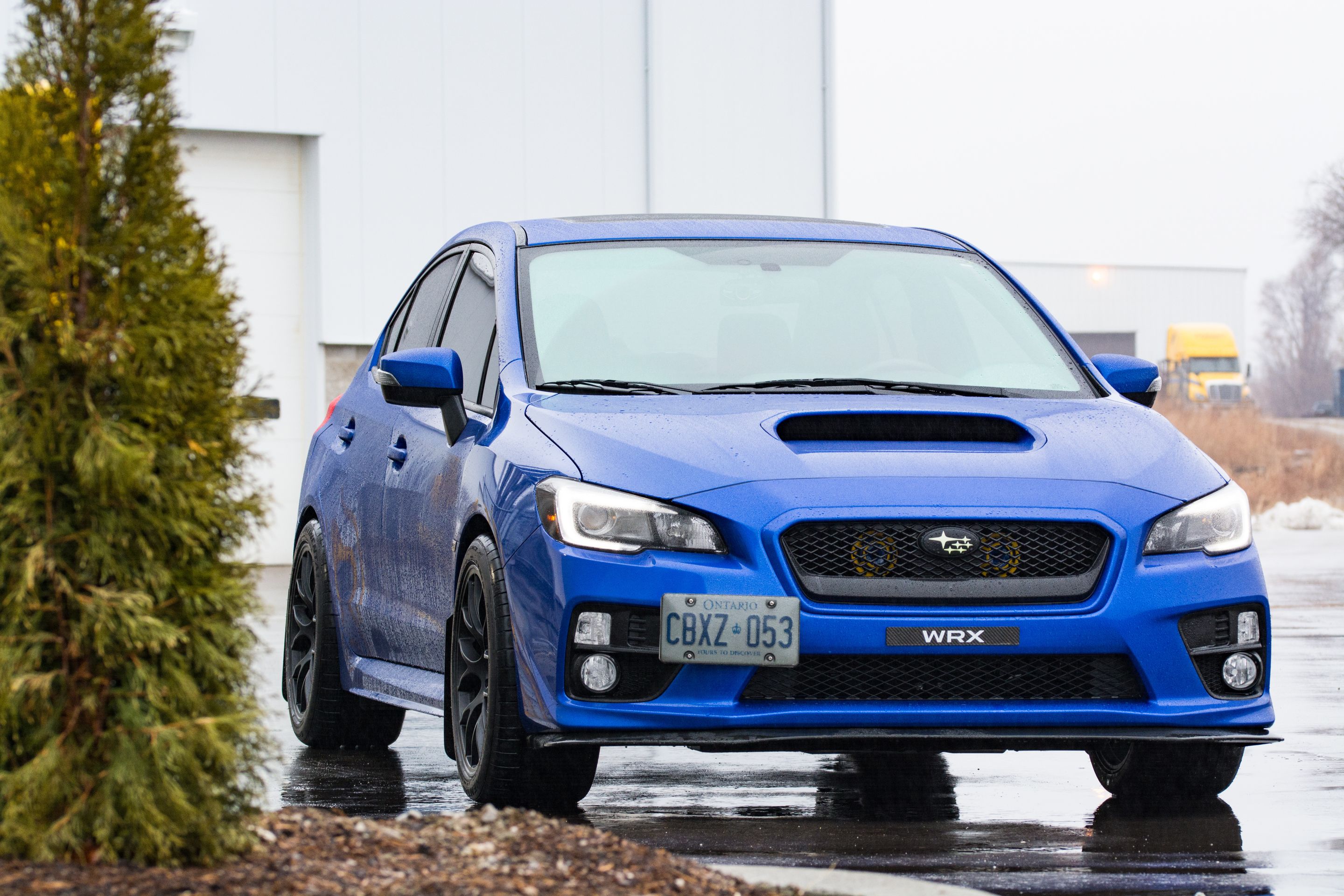 Blue Subaru VA WRX with 18" EC-7 Apex wheels in Satin Black