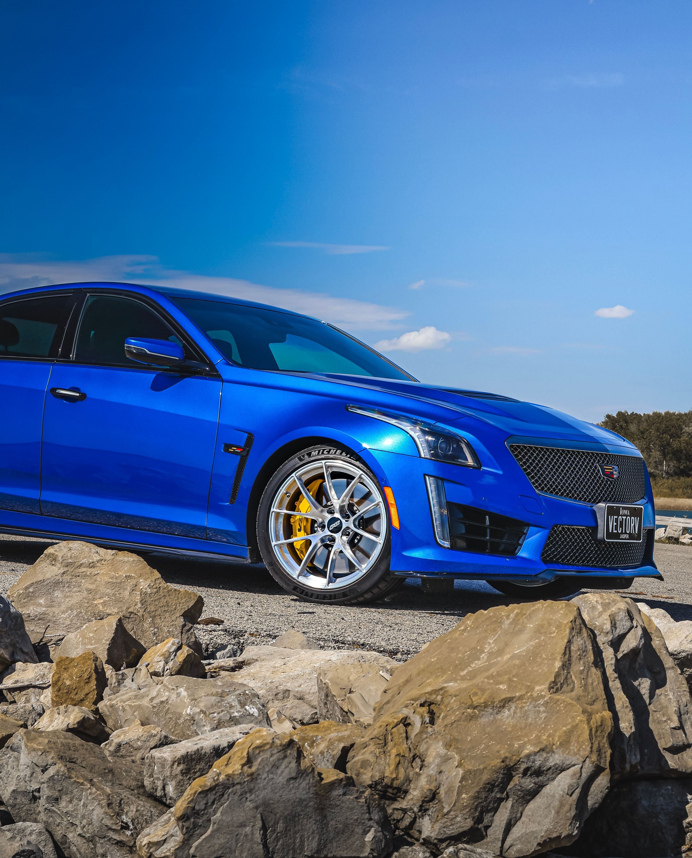 Blue Cadillac Gen 3 CTS-V with 19" VS-5RS Apex wheels in Brushed Clear