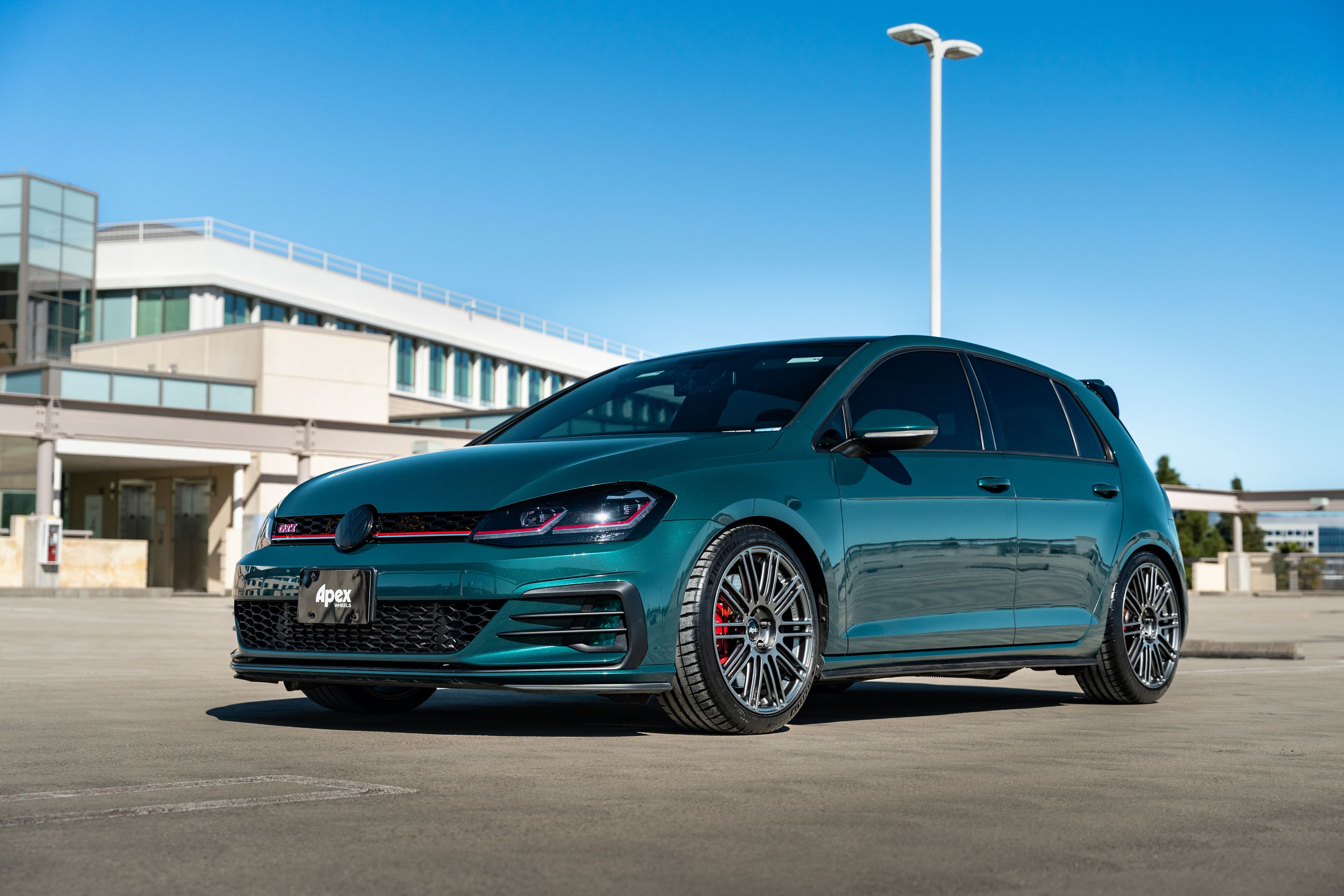 Green VW MK7 GTI with 18" TC-10RT Apex wheels in Anthracite