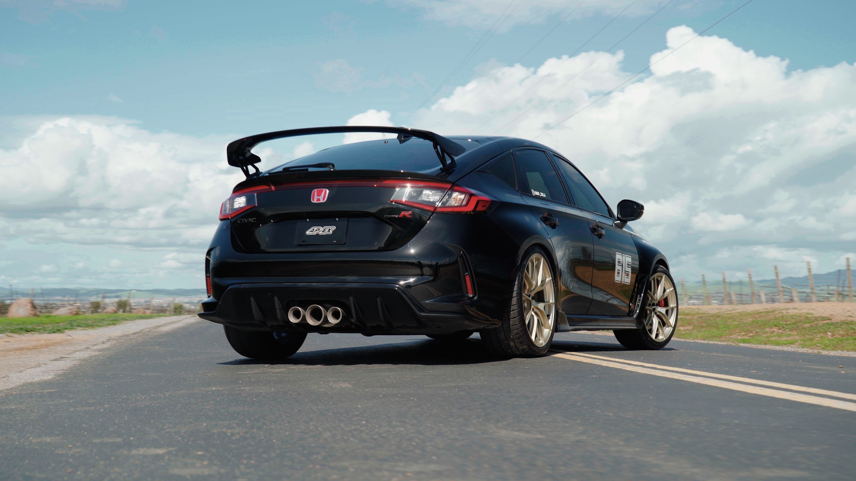 Black Honda FL5 Civic Type-R with 19" VS-5RS Apex wheels in Motorsport Gold