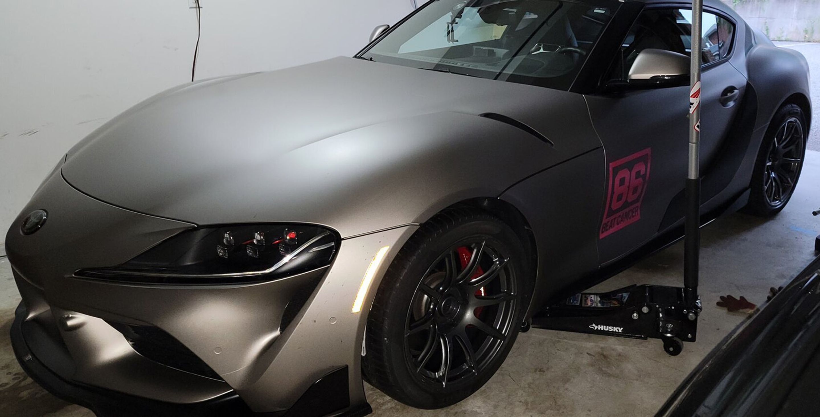Grey Toyota GR Supra with 18" SM-10 Apex wheels in Anthracite