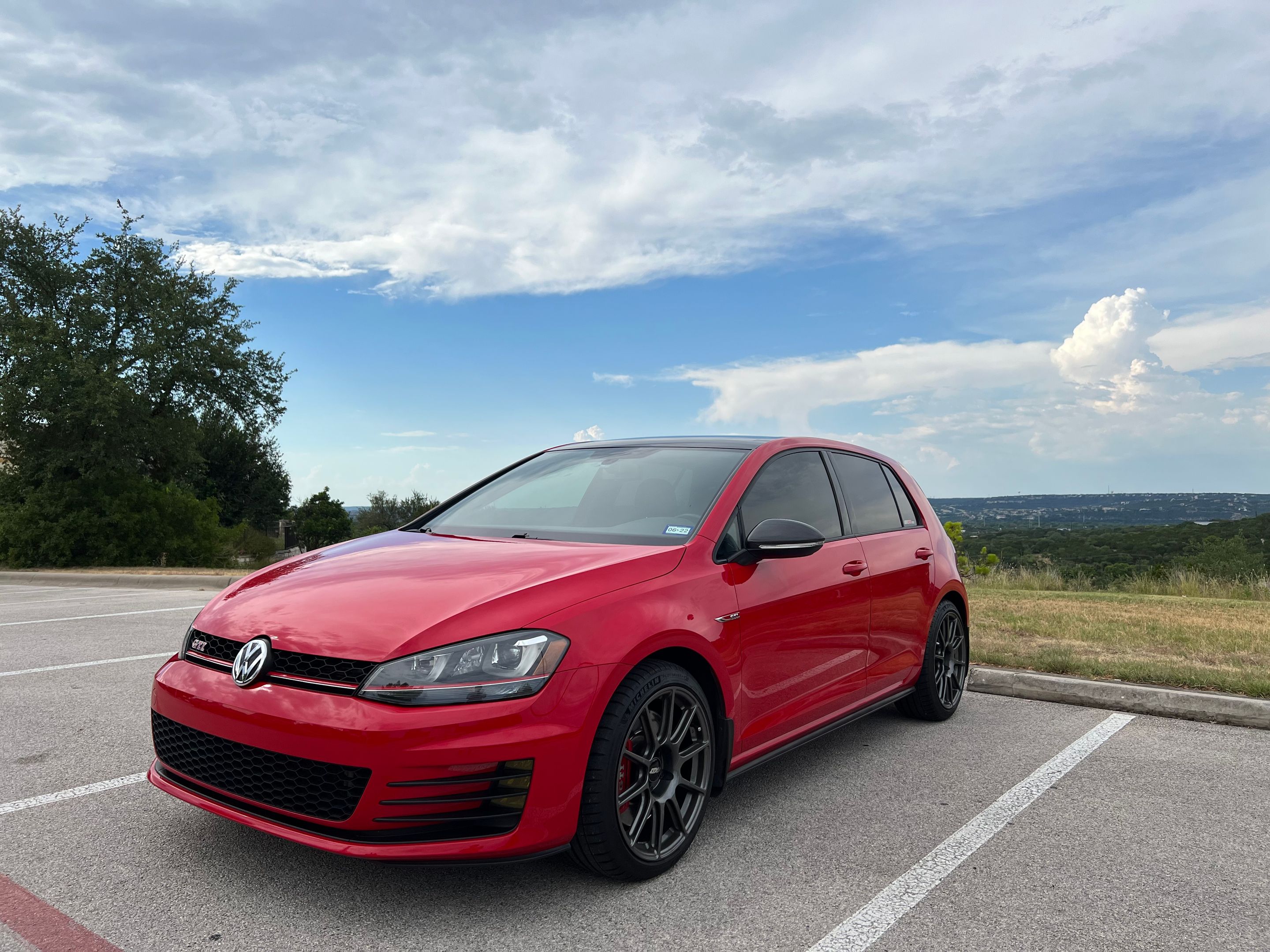 Red VW MK7 GTI with 18" SM-10 Apex wheels in Anthracite