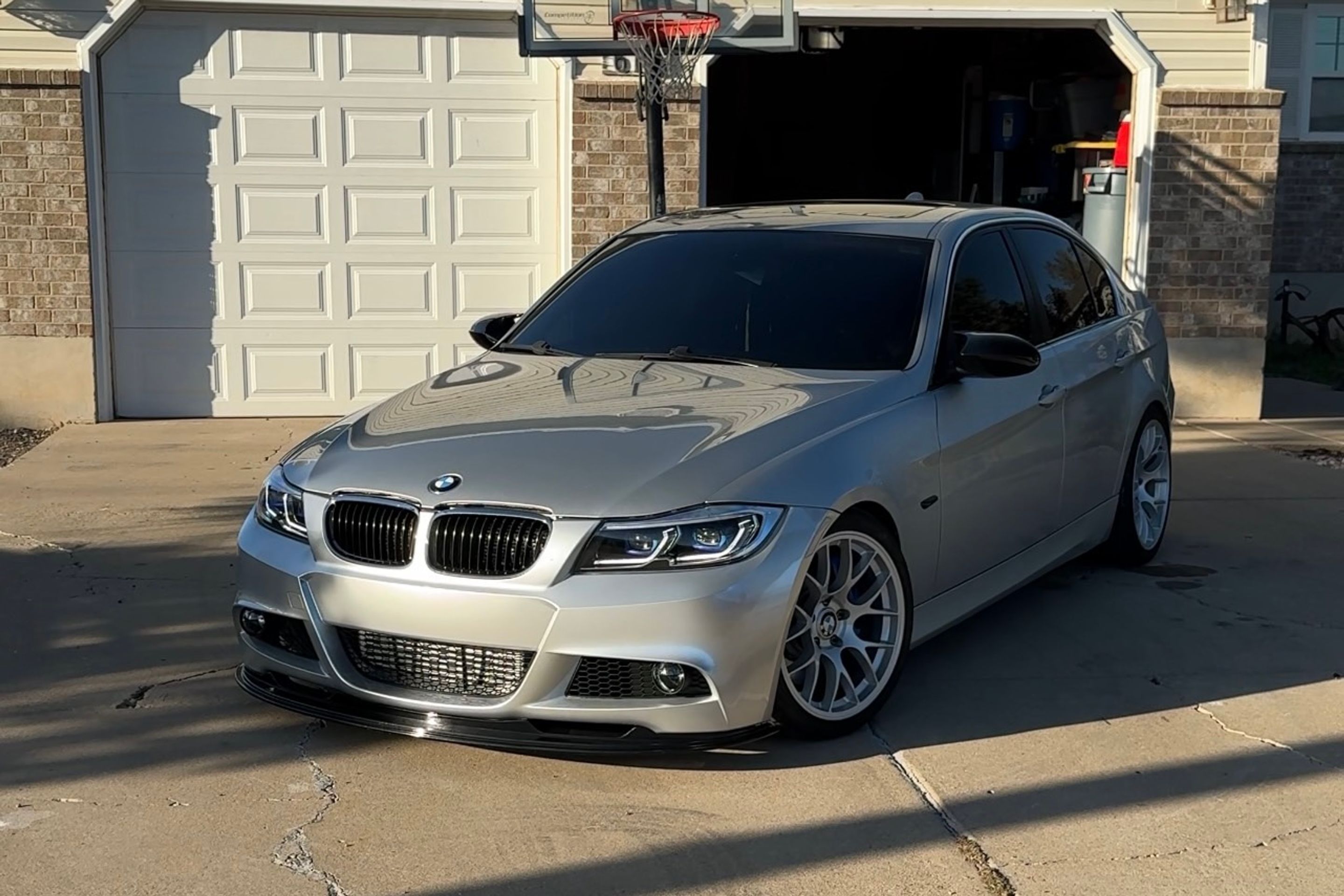 Silver BMW E90 Sedan 3 Series with 18" EC-7 Apex wheels in Race Silver