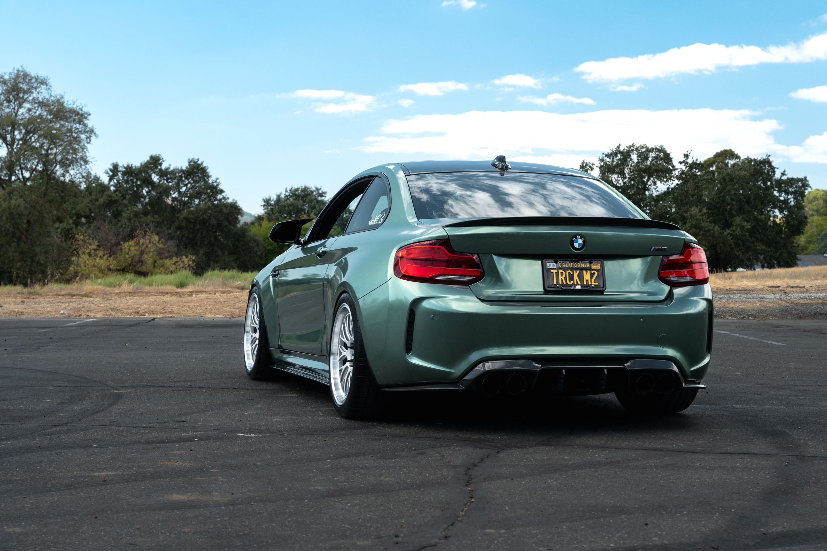 Green BMW F87 M2 with 19" ML-10RT Apex wheels in Machined Lip Race Silver