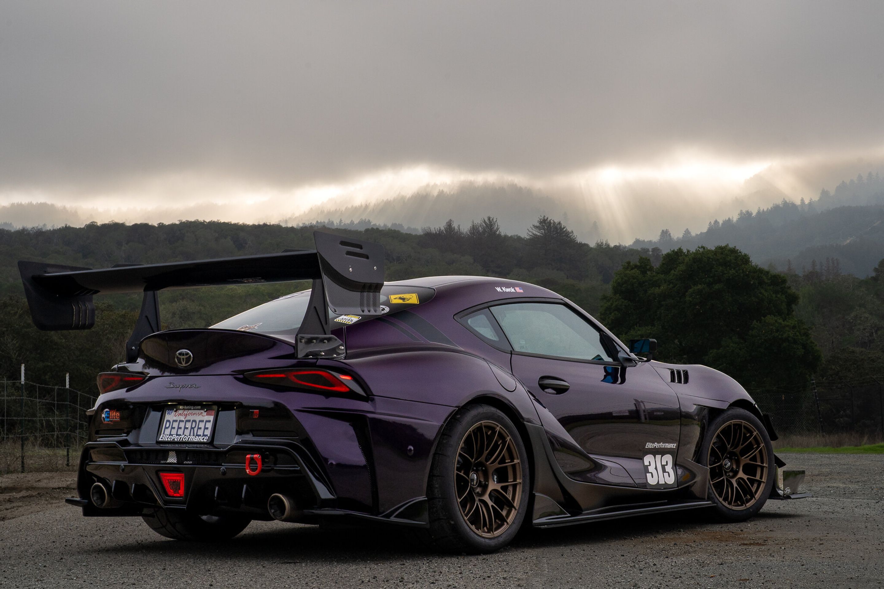 Purple Toyota GR Supra with 18" EC-7RS Apex wheels in Satin Bronze