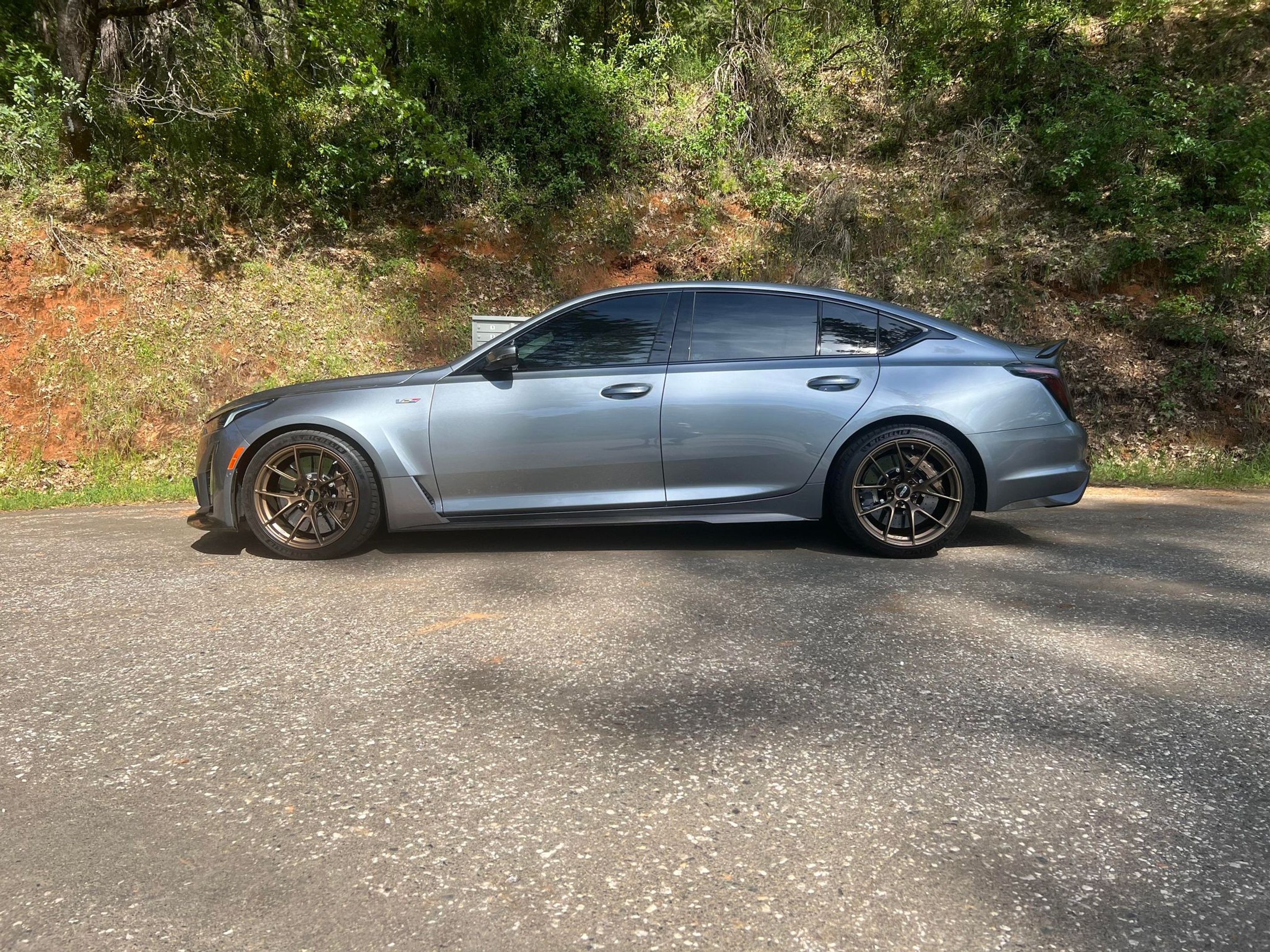 Grey Cadillac CT5-V Blackwing with 19" VS-5RS Apex wheels in Satin Bronze
