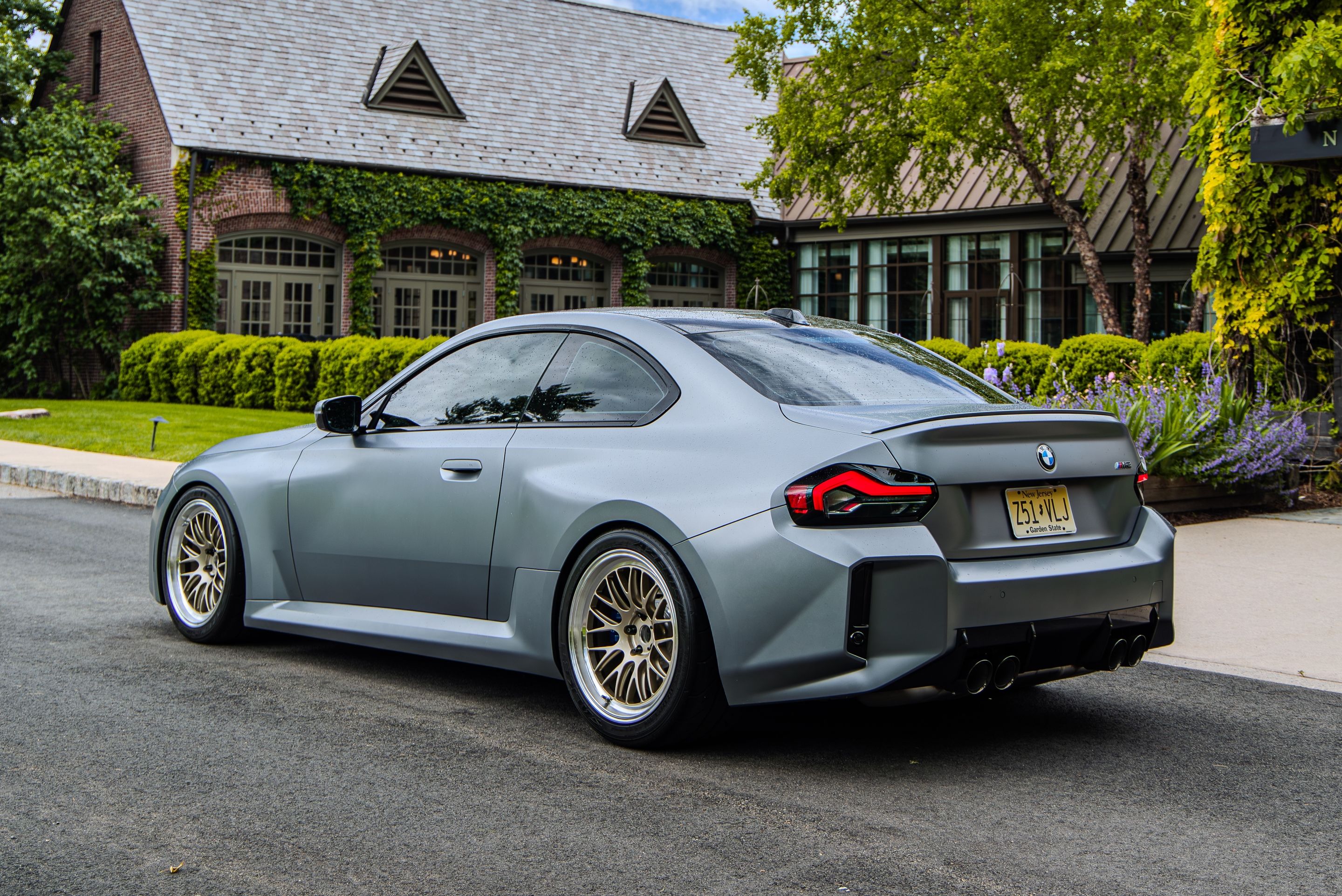 Grey BMW G87 M2 with 19" ML-10RT Apex wheels in Machined Lip Gloss Motorsport Gold
