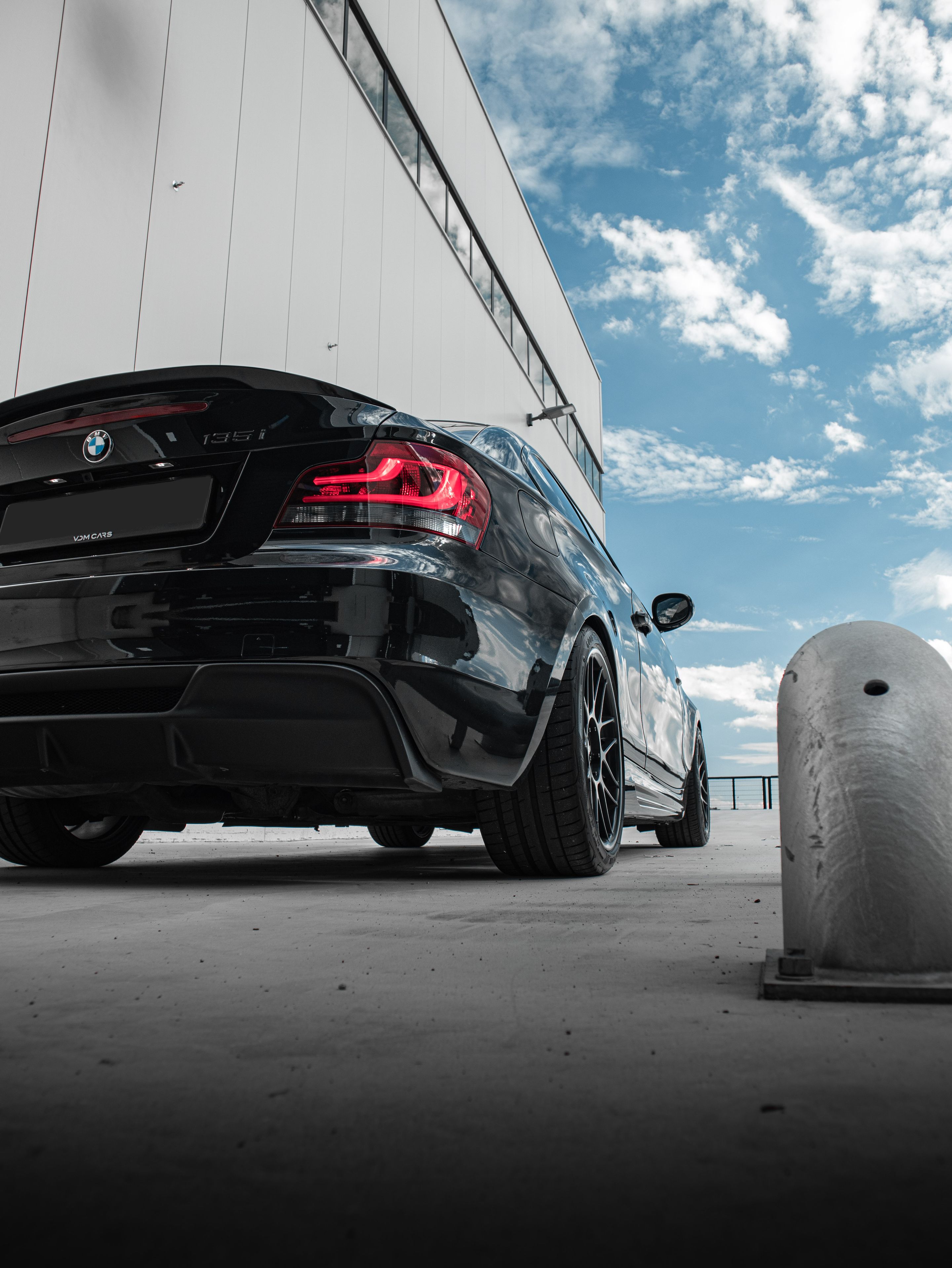 Black BMW E82 Coupe 1 Series with 18" ARC-8 Apex wheels in Satin Black