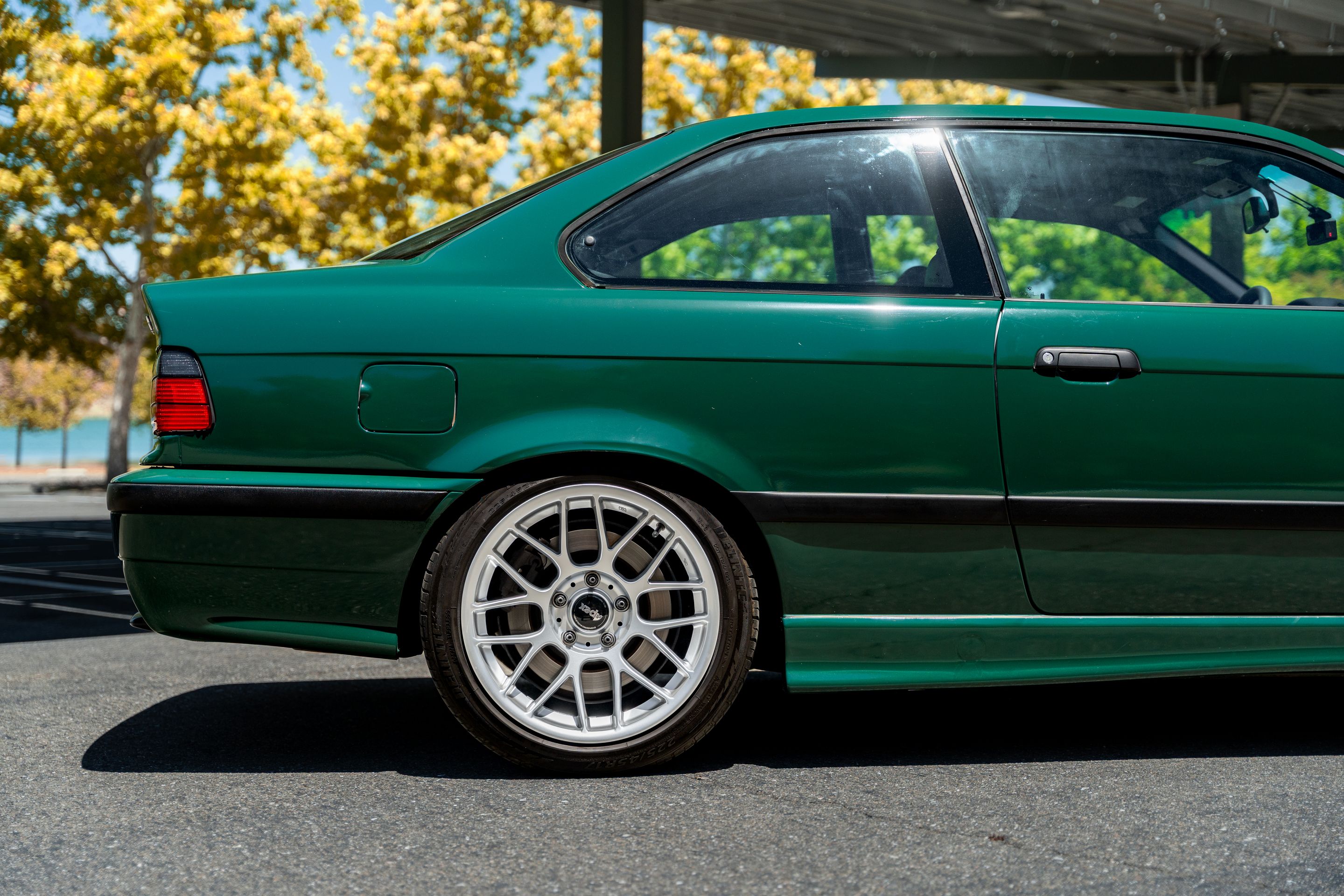 Green BMW E36 M3 with 17" ARC-8 Apex wheels in Race Silver