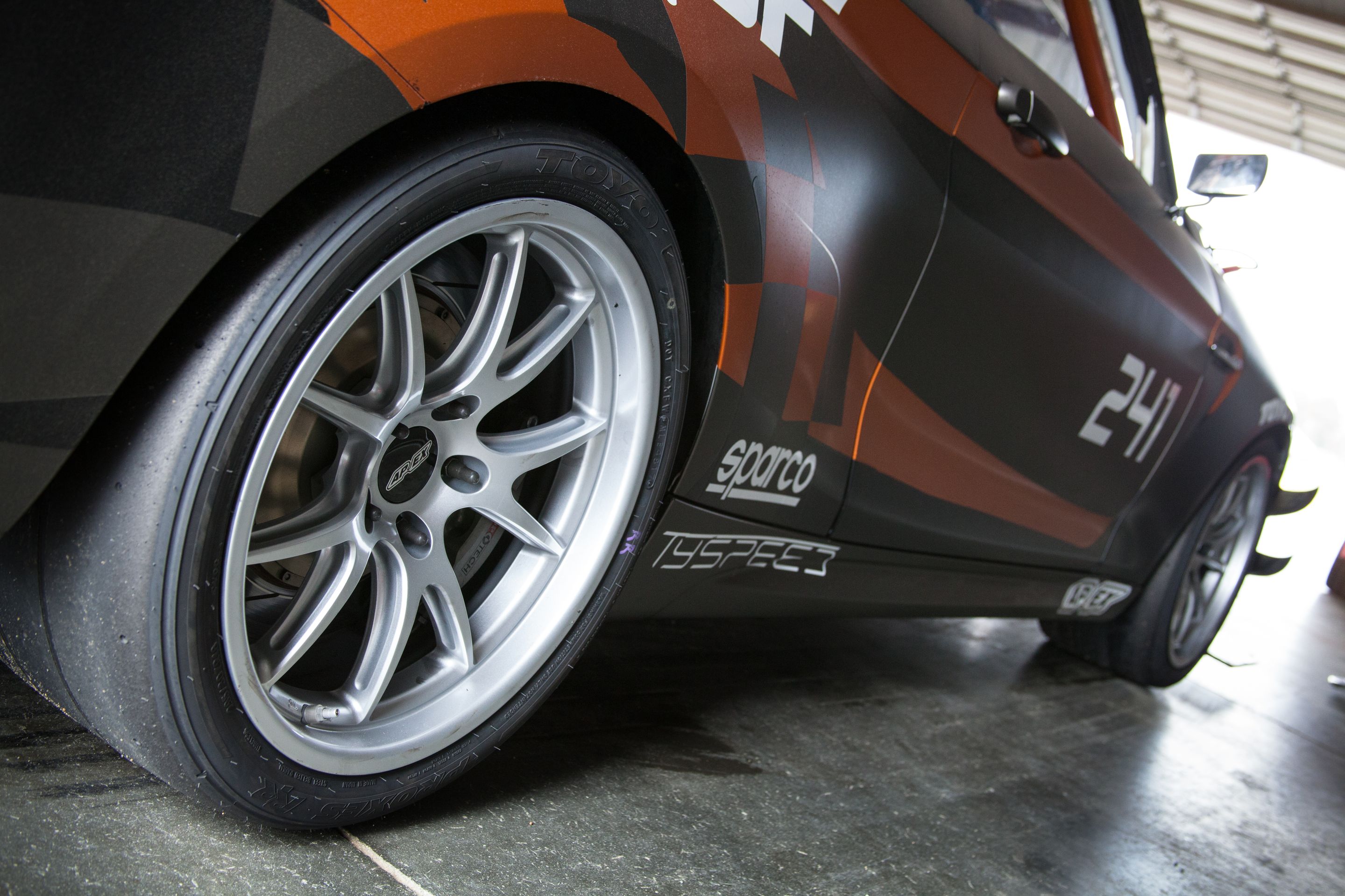 Multicolor BMW F87 M2 with 18" FL-5 Apex wheels in Race Silver