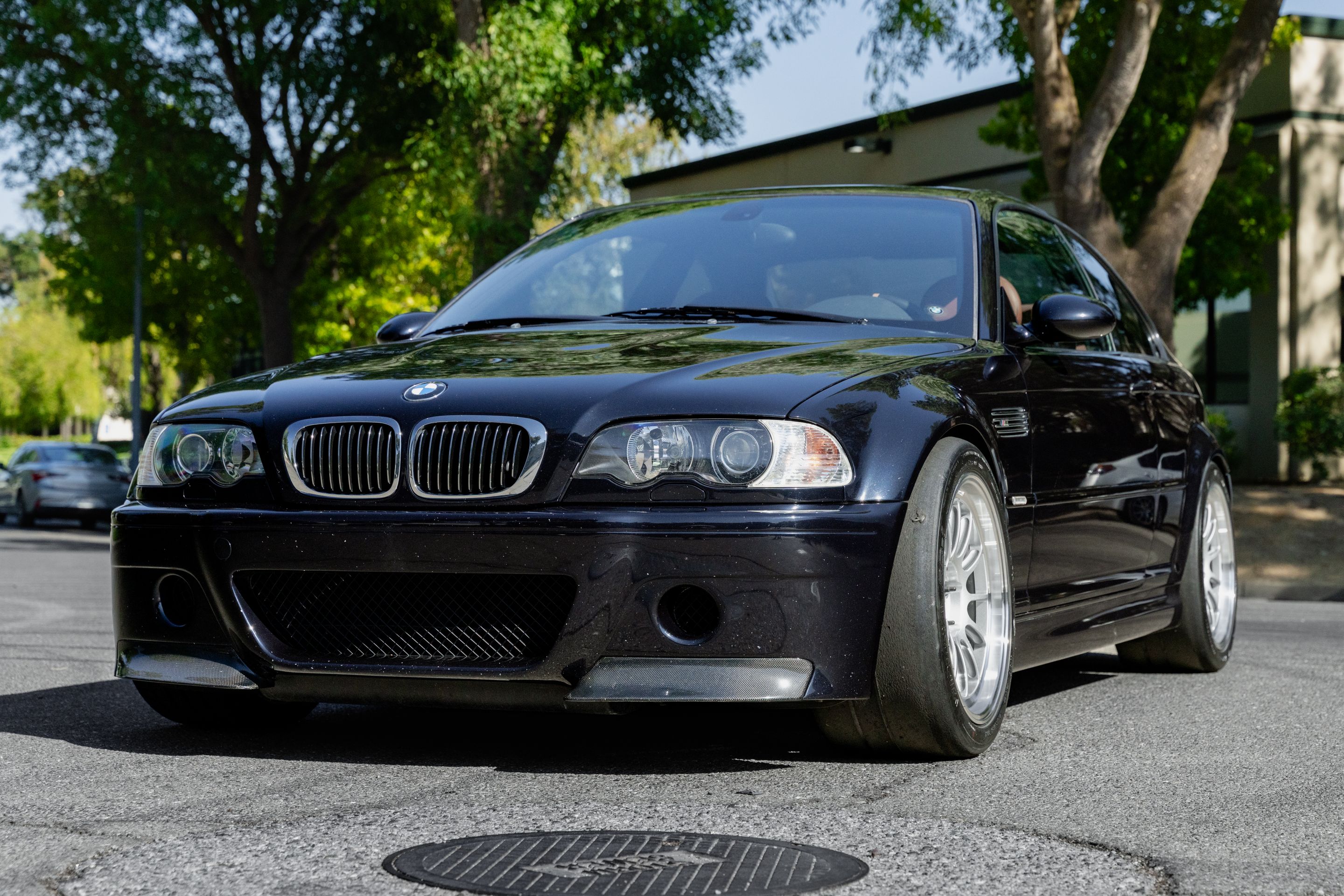 Black BMW E46 M3 with 18" SL-12 Apex wheels in Machined Lip Race Silver