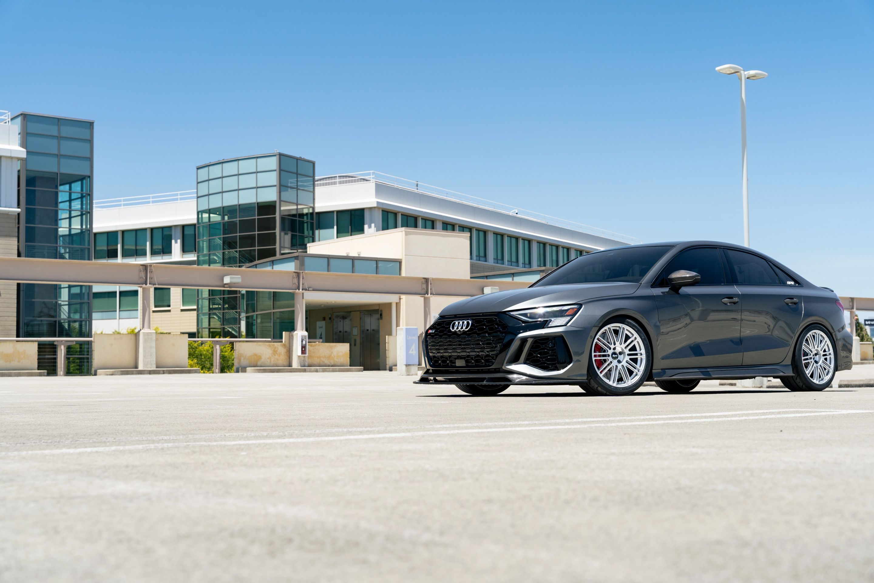 Grey Audi 8Y RS 3 with 18" TC-10RT Apex wheels in Race Silver