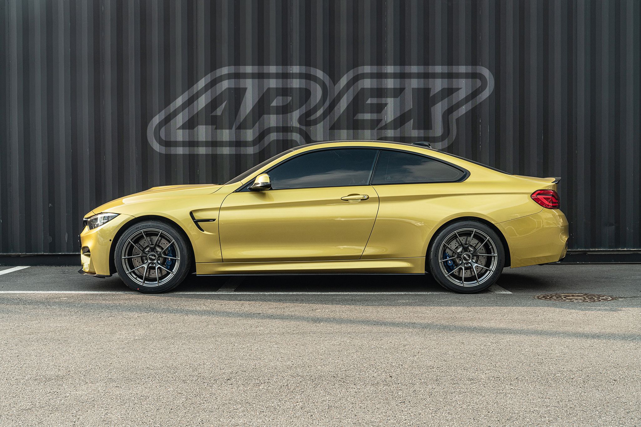 Yellow BMW F82 Coupe M4 with 19" VS-5RS Apex wheels in Anthracite